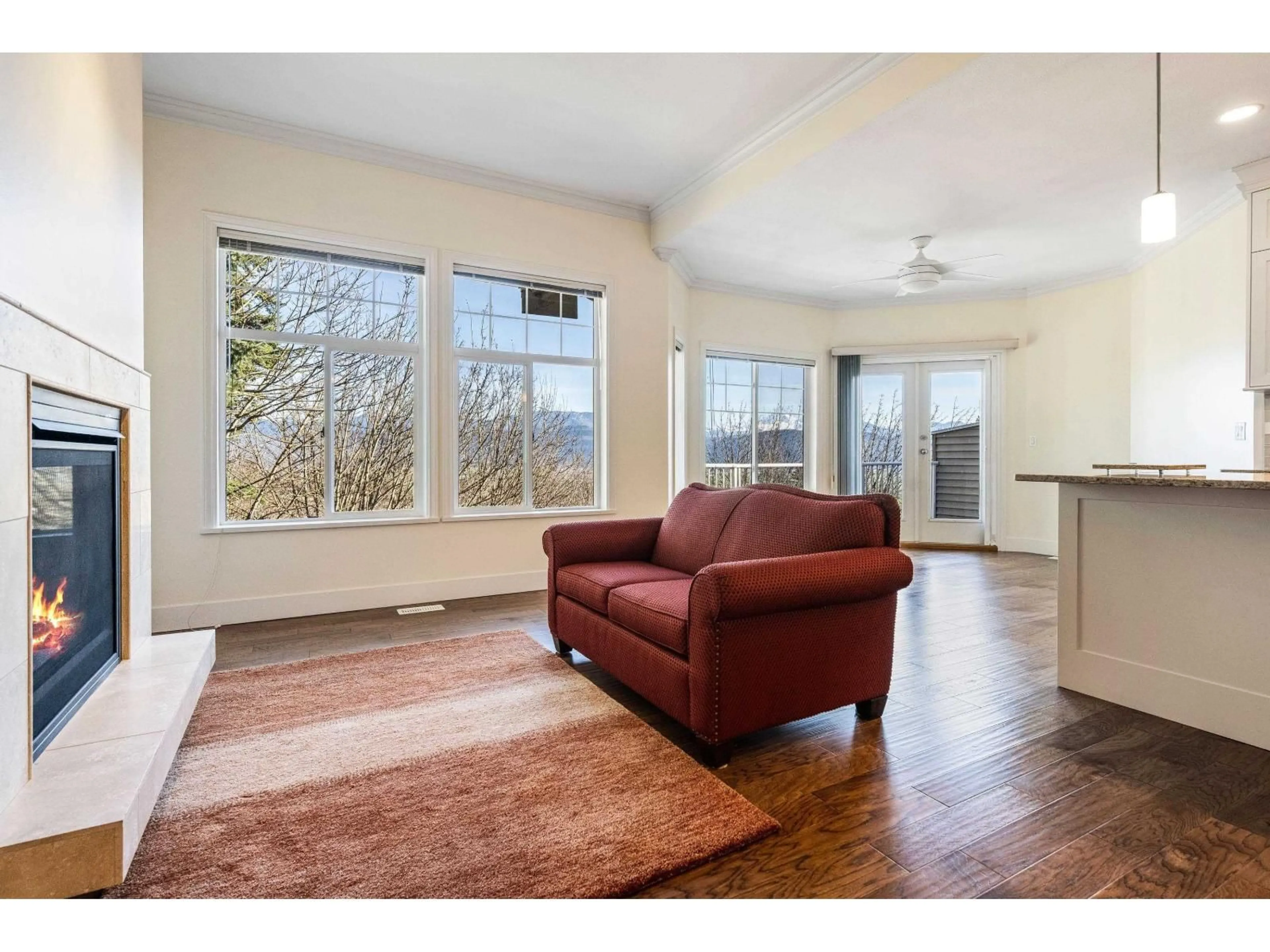 Living room with furniture, wood/laminate floor for 7 - 35537 EAGLE MOUNTAIN DRIVE, Abbotsford British Columbia V3G2Z4