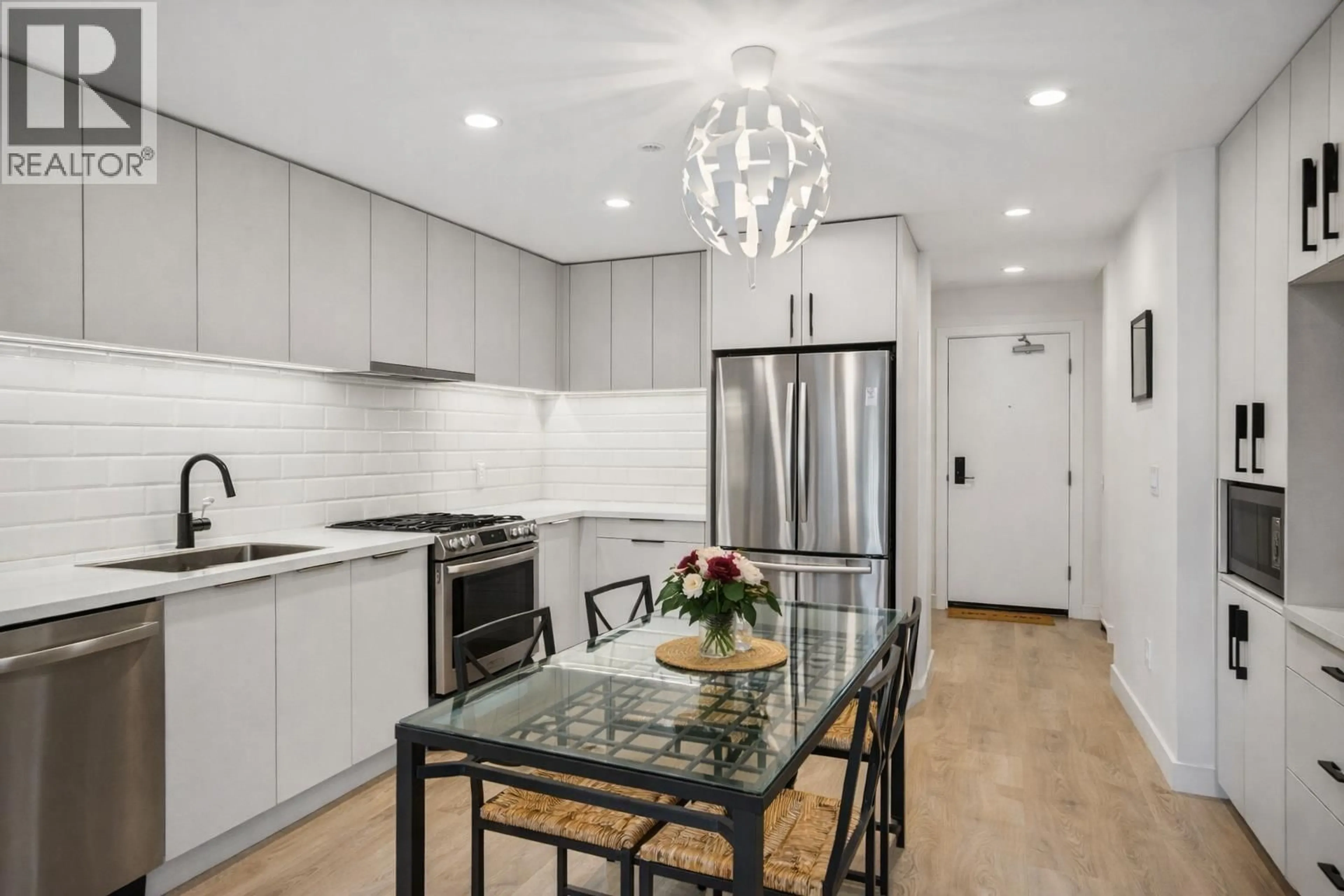 Open concept kitchen, ceramic/tile floor for 310 - 3018 ST GEORGE STREET, Port Moody British Columbia V3H2H7