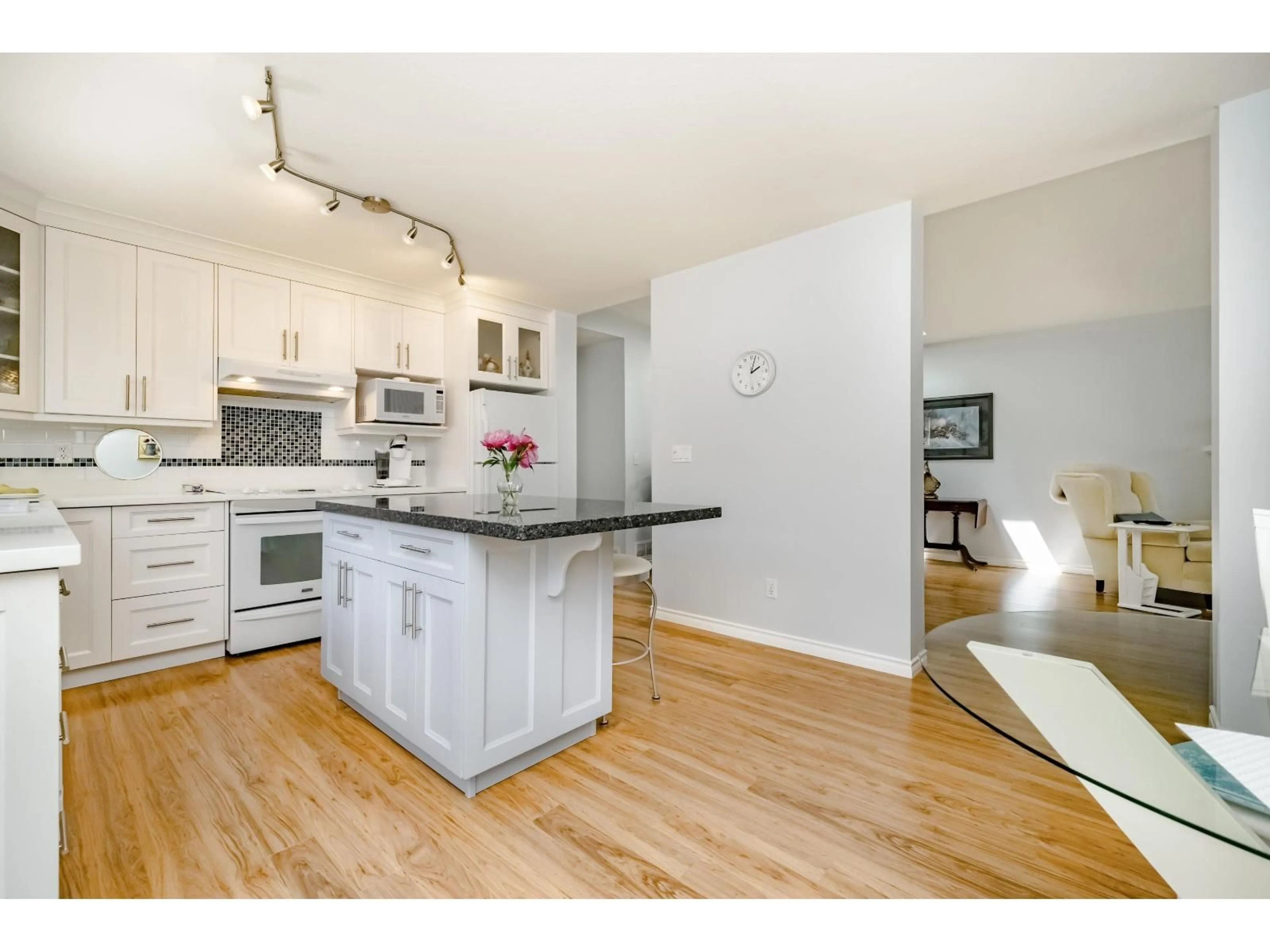 Open concept kitchen, wood/laminate floor for 65 - 1400 164 STREET, Surrey British Columbia V4A8V8