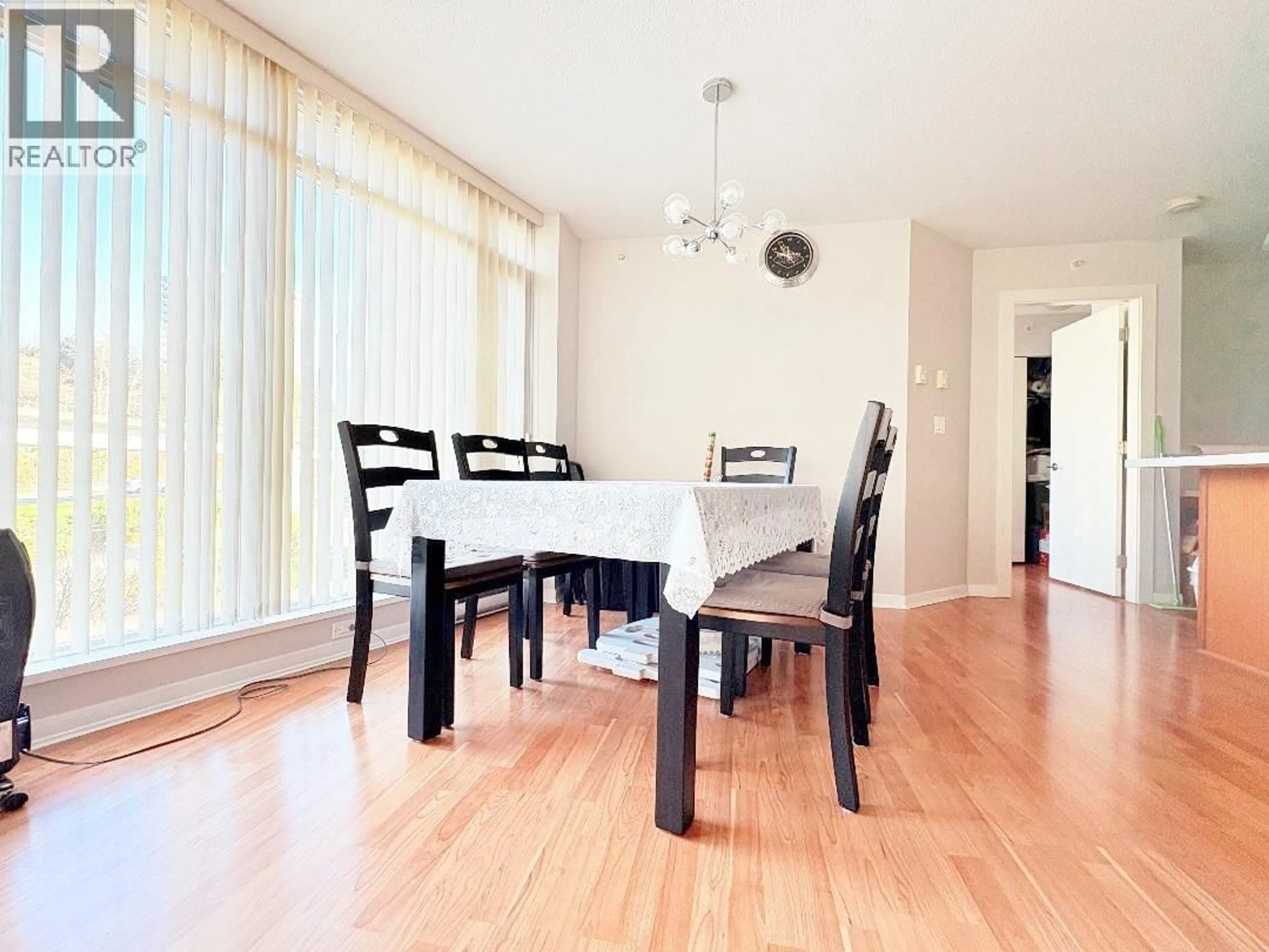 Dining room, wood/laminate floor for 502 - 2133 DOUGLAS ROAD, Burnaby British Columbia V5C0E9