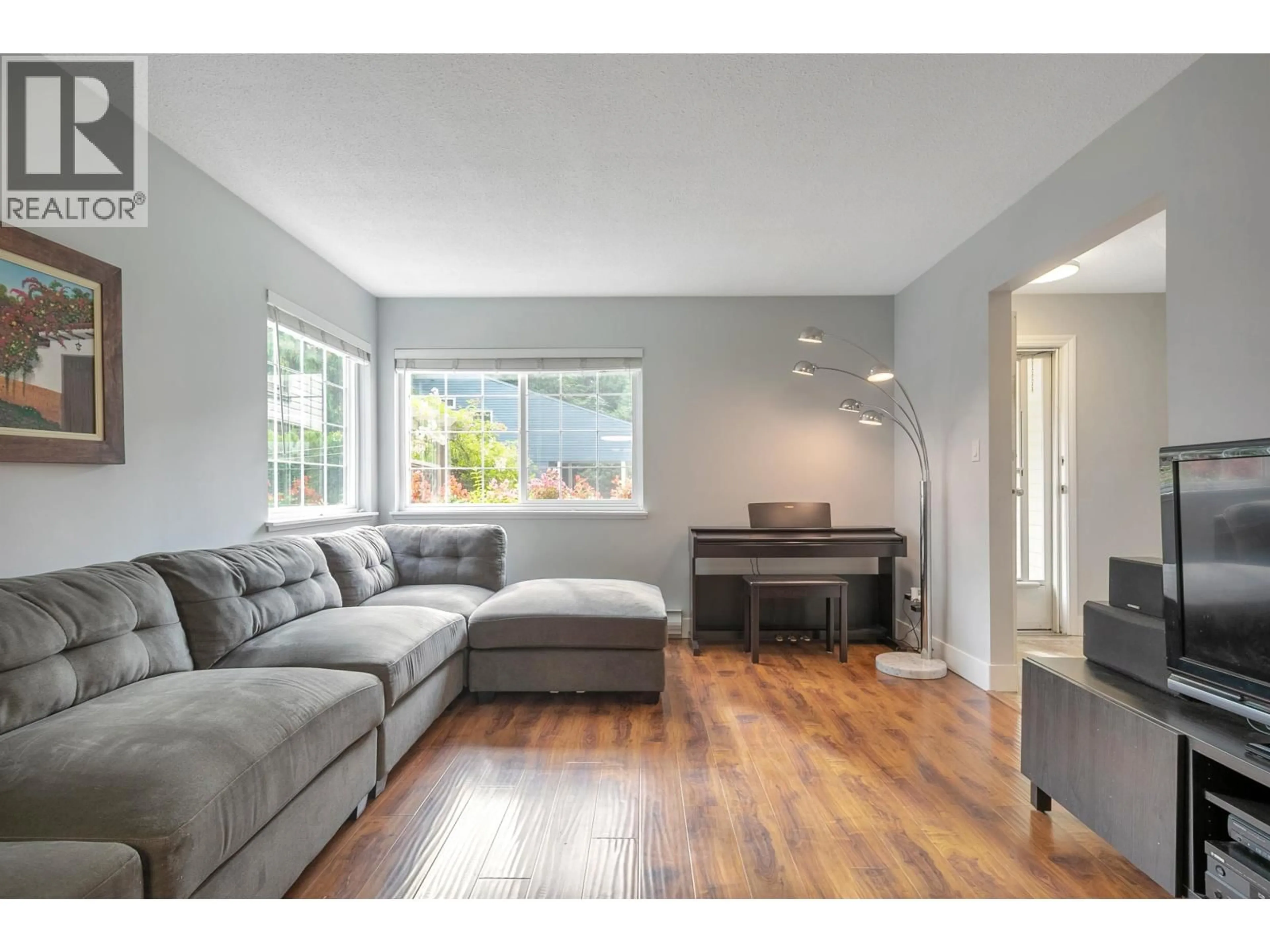 Living room with furniture, wood/laminate floor for 41 - 2986 COAST MERIDIAN ROAD, Port Coquitlam British Columbia V3B3M8