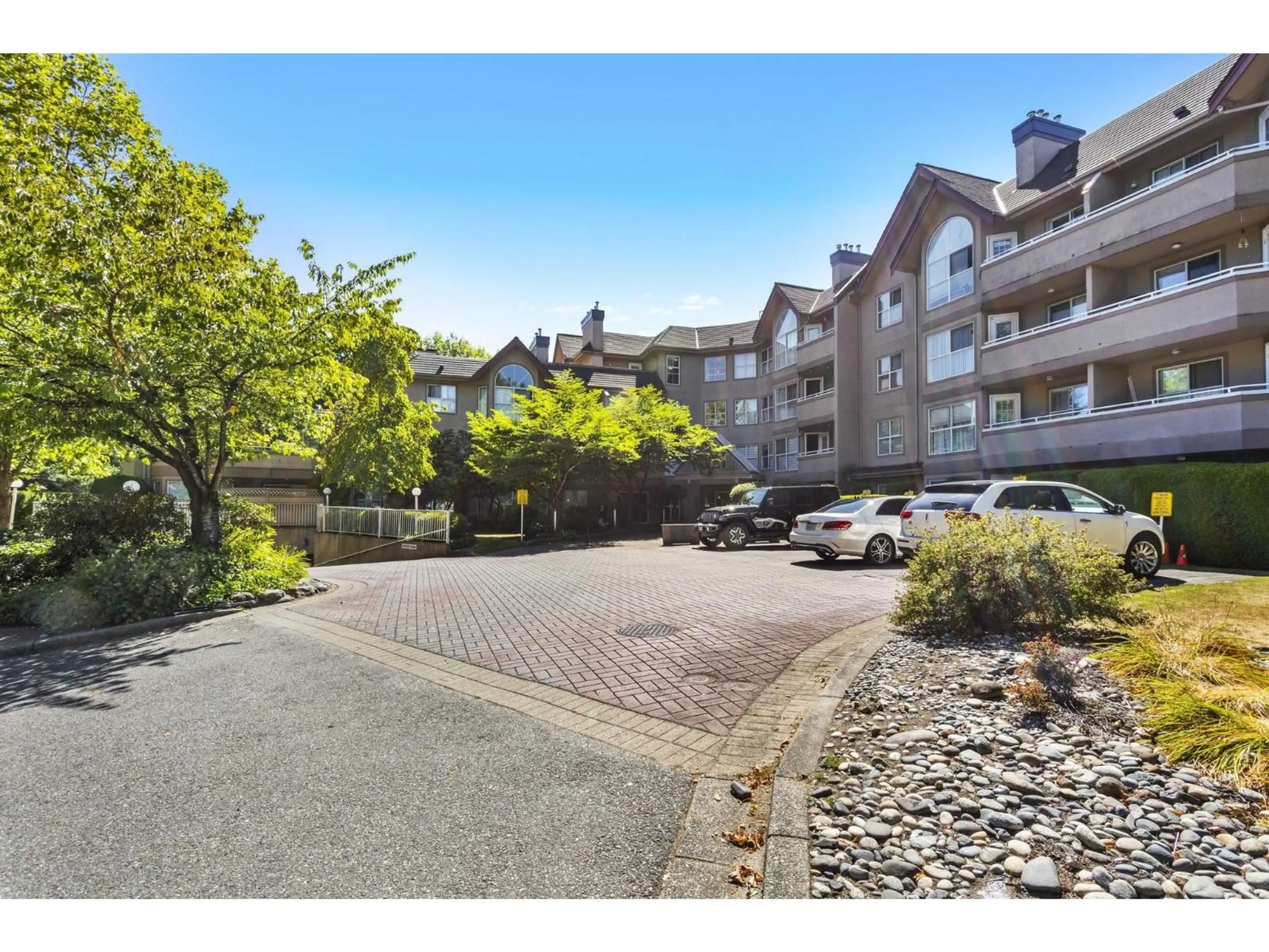 A pic from outside/outdoor area/front of a property/back of a property/a pic from drone, unknown for 310 - 7435 121A STREET, Surrey British Columbia V3W0W8