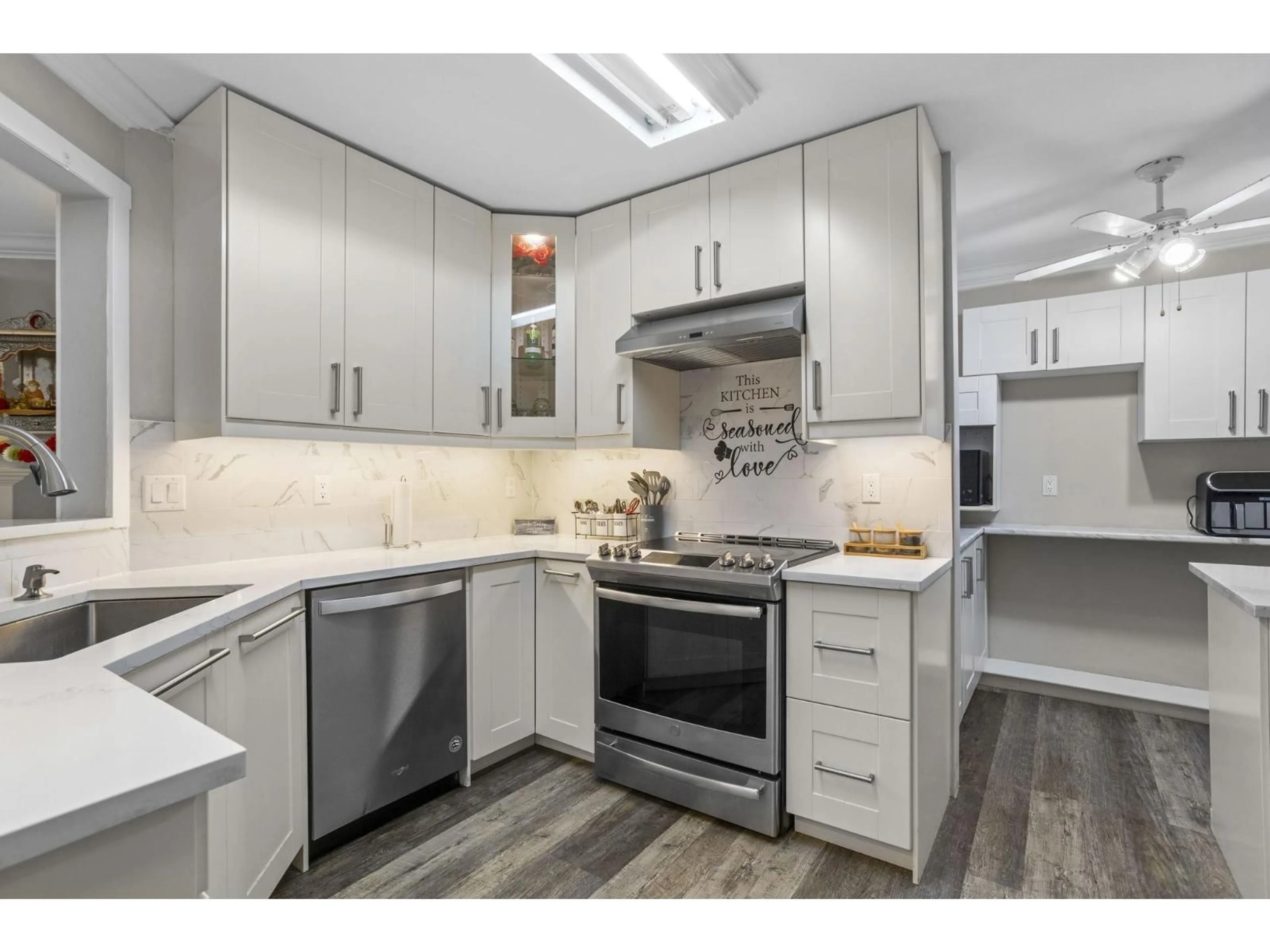 Open concept kitchen, unknown for 310 - 7435 121A STREET, Surrey British Columbia V3W0W8