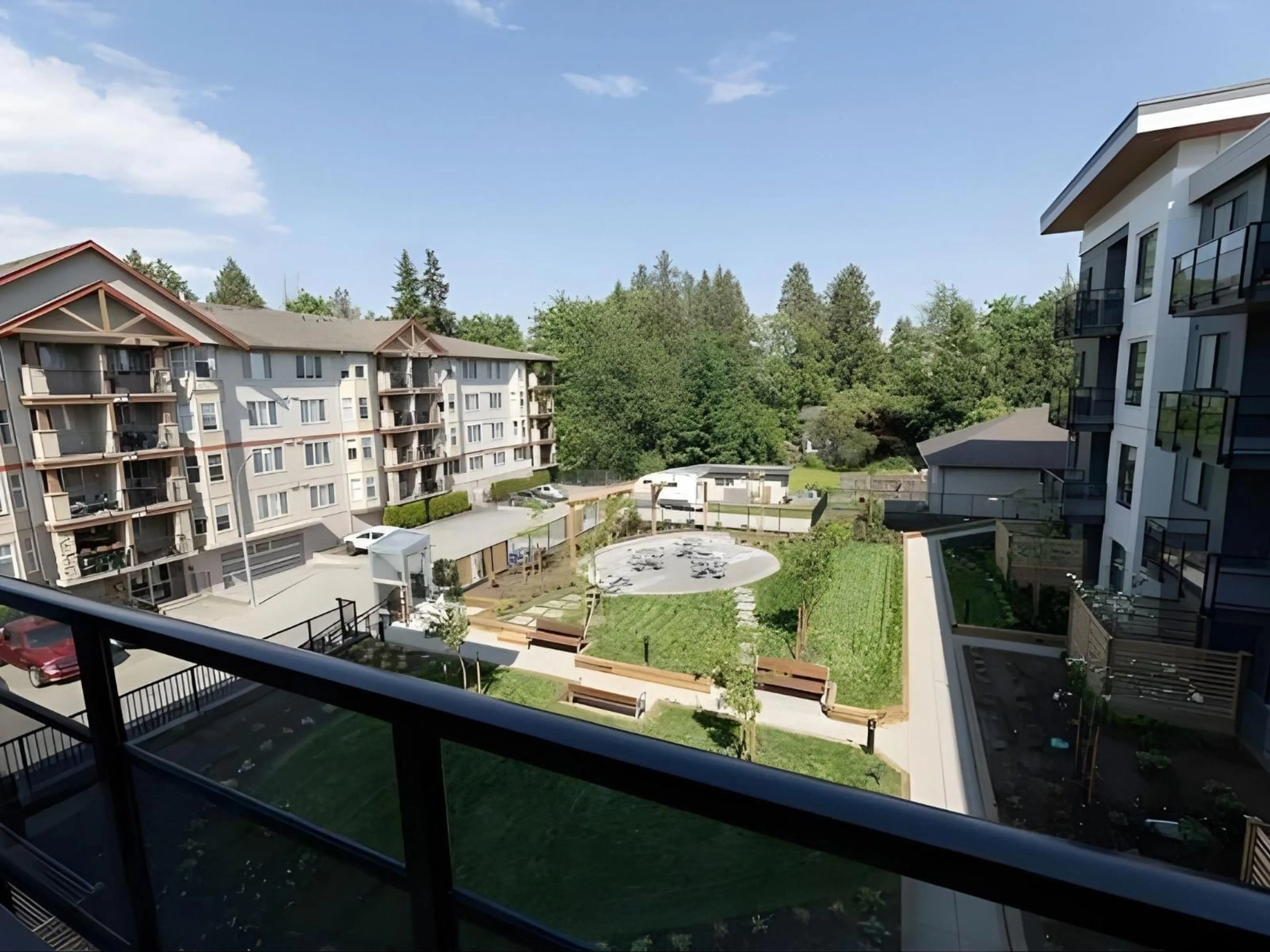 Balcony in the apartment, city buildings view from balcony for 302 - 19825 54 AVENUE, Langley British Columbia V3A0P6