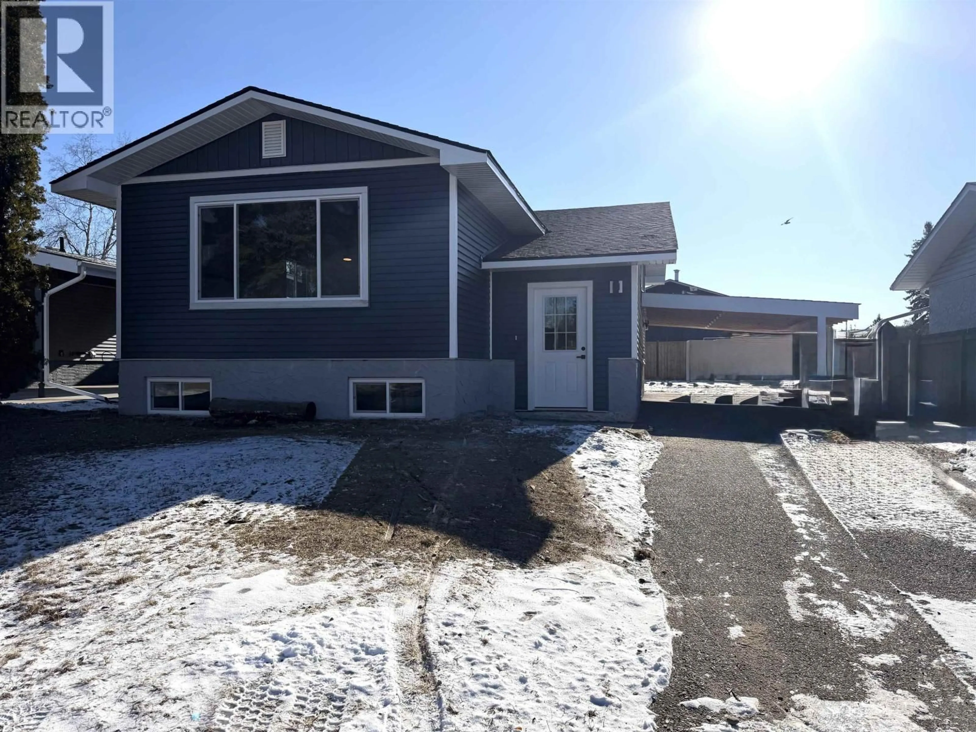 Home with vinyl exterior material, street for 4379 EWEN AVENUE, Prince George British Columbia V2M5Y8