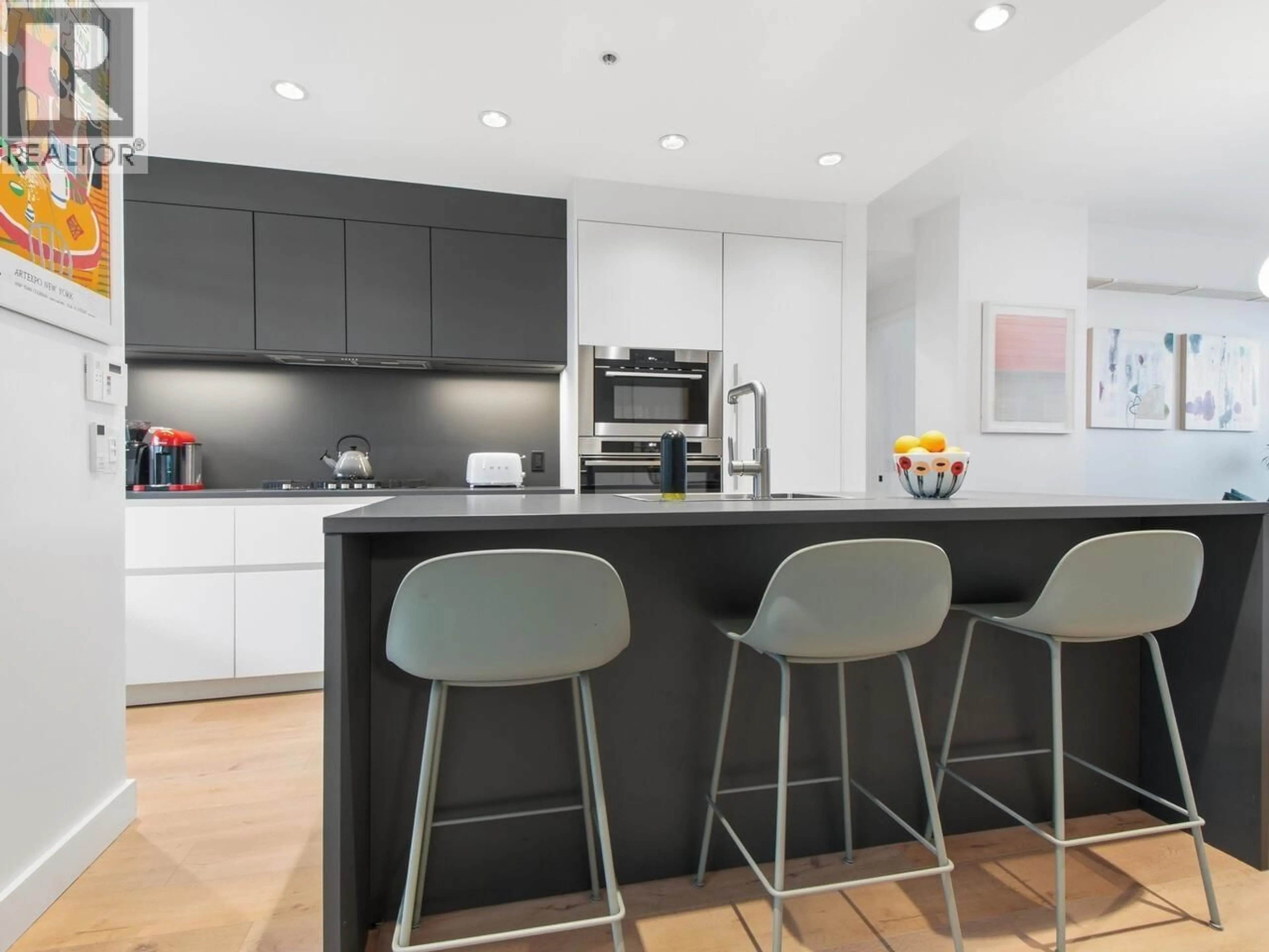 Contemporary kitchen, unknown for 313 - 77 WALTER HARDWICK AVENUE, Vancouver British Columbia V5Y0C8