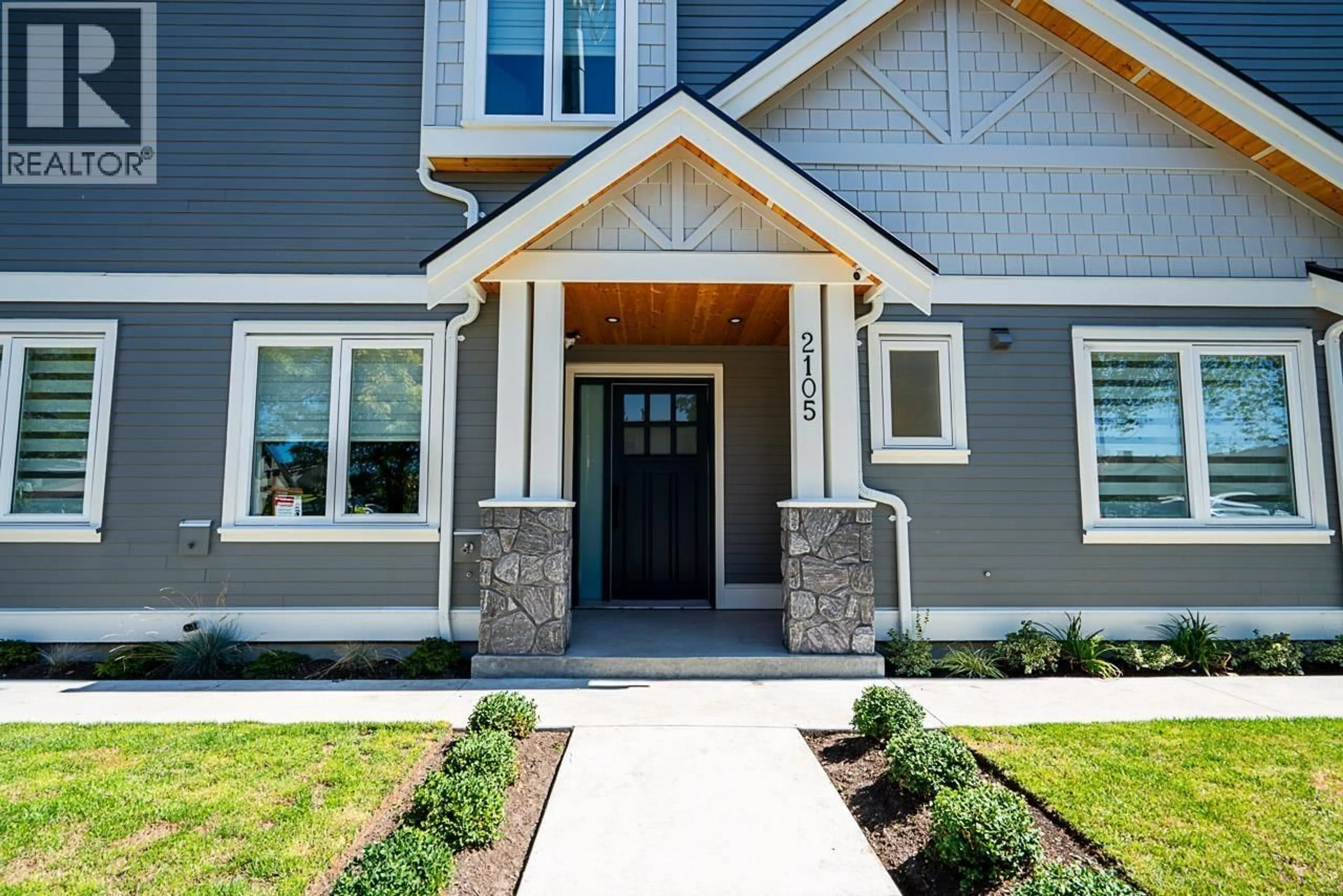 Home with vinyl exterior material, street for 2105 33RD AVENUE, Vancouver British Columbia V5N3E9