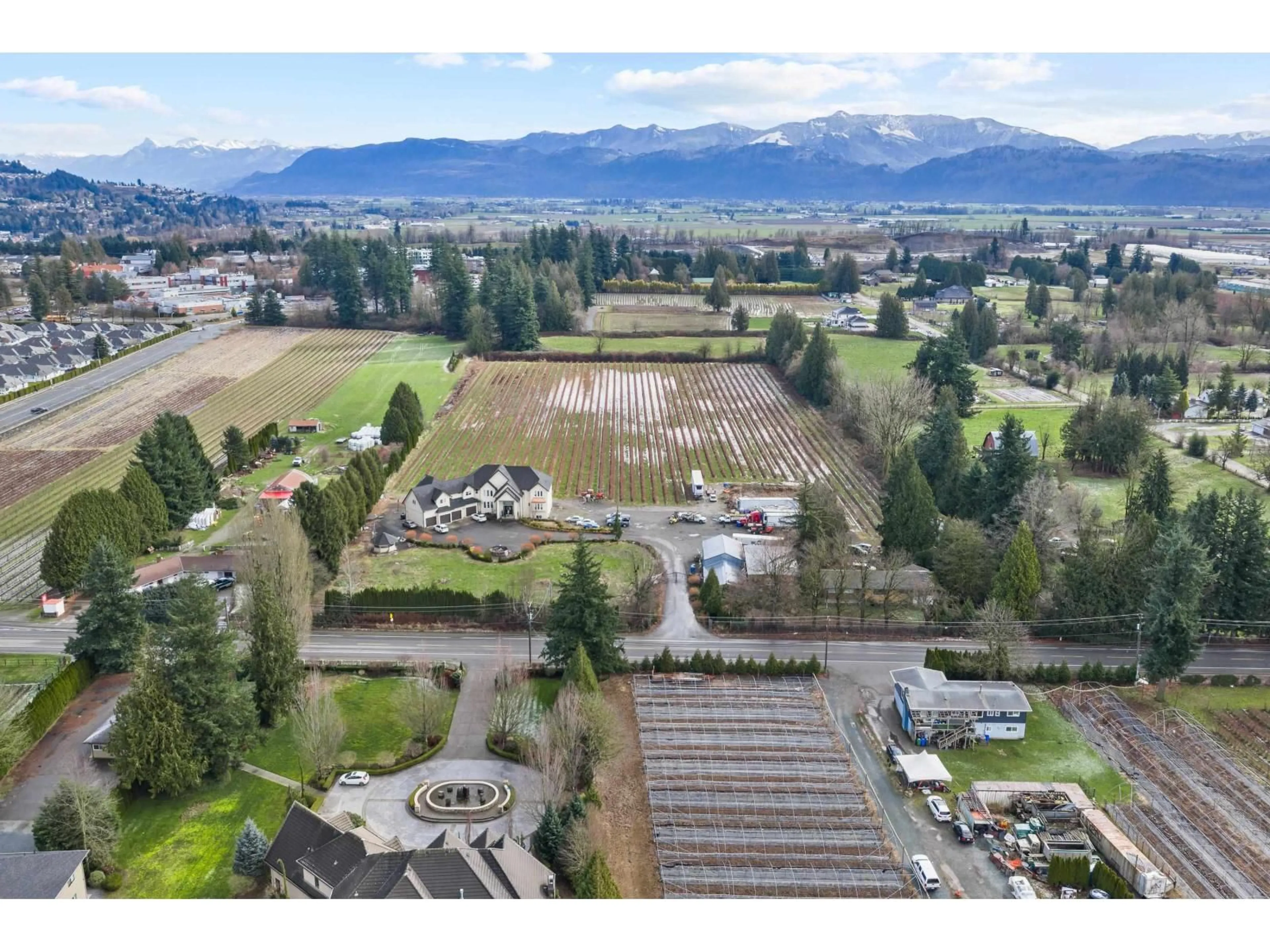 A pic from outside/outdoor area/front of a property/back of a property/a pic from drone, mountain view for 1264 MCCALLUM ROAD, Abbotsford British Columbia V2S8A3