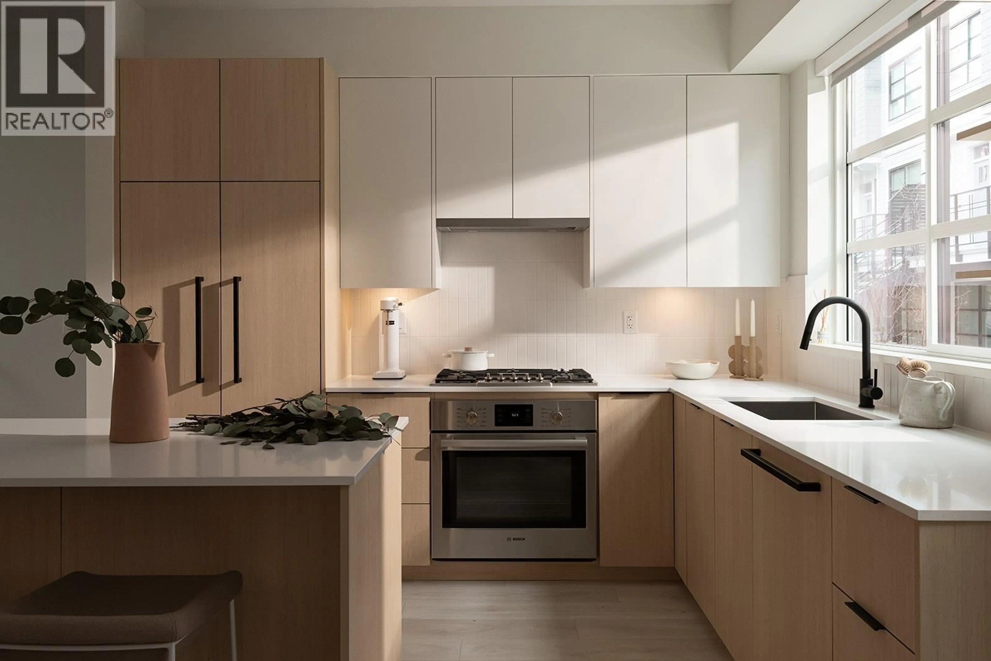 Contemporary kitchen, ceramic/tile floor for 126 - 2045 HERITAGE PARK LANE, North Vancouver British Columbia V7H0E3