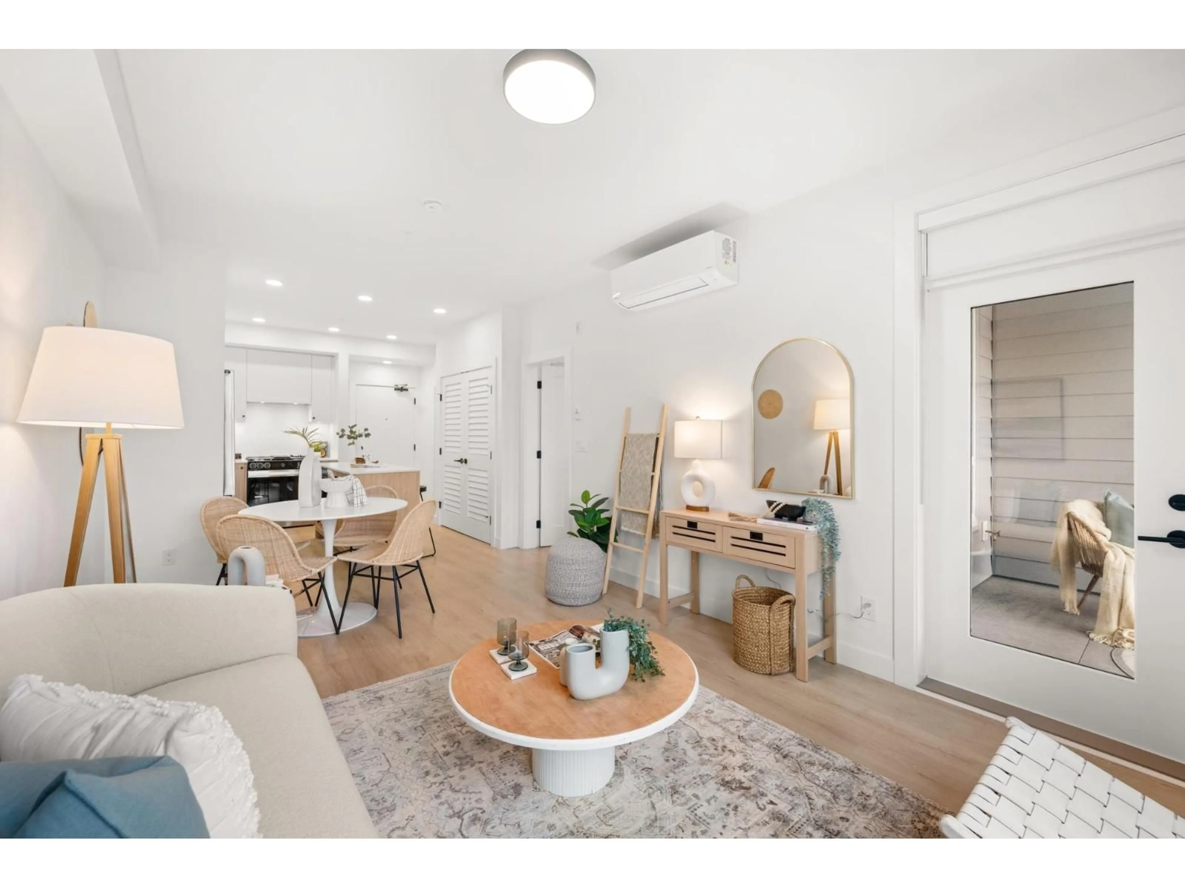 Living room with furniture, wood/laminate floor for 107 - 19911 76 AVENUE, Langley British Columbia V2Y1S2