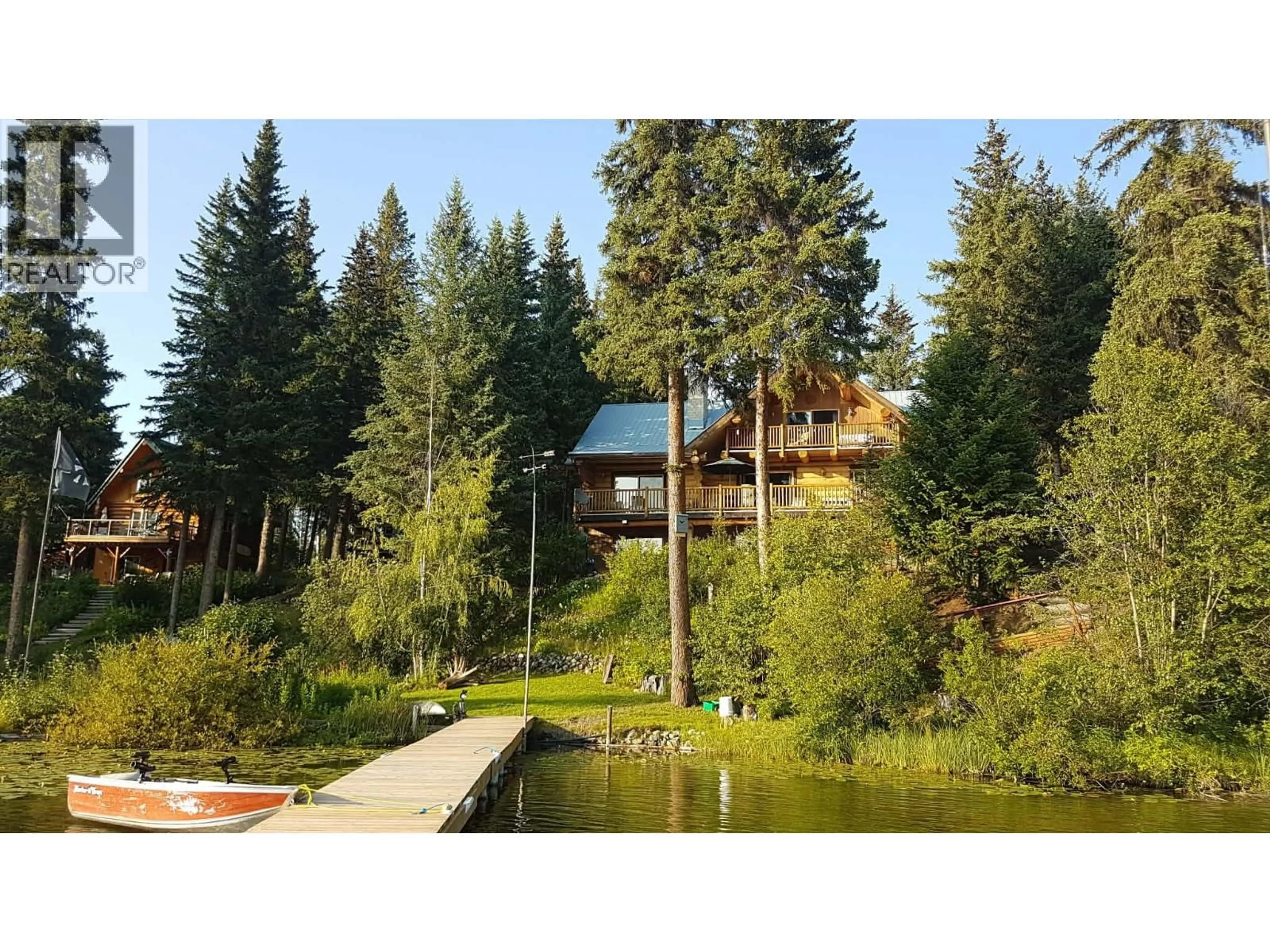 A pic from outside/outdoor area/front of a property/back of a property/a pic from drone, unknown for 8494 GERALD CRESCENT, Bridge Lake British Columbia V0K1E0