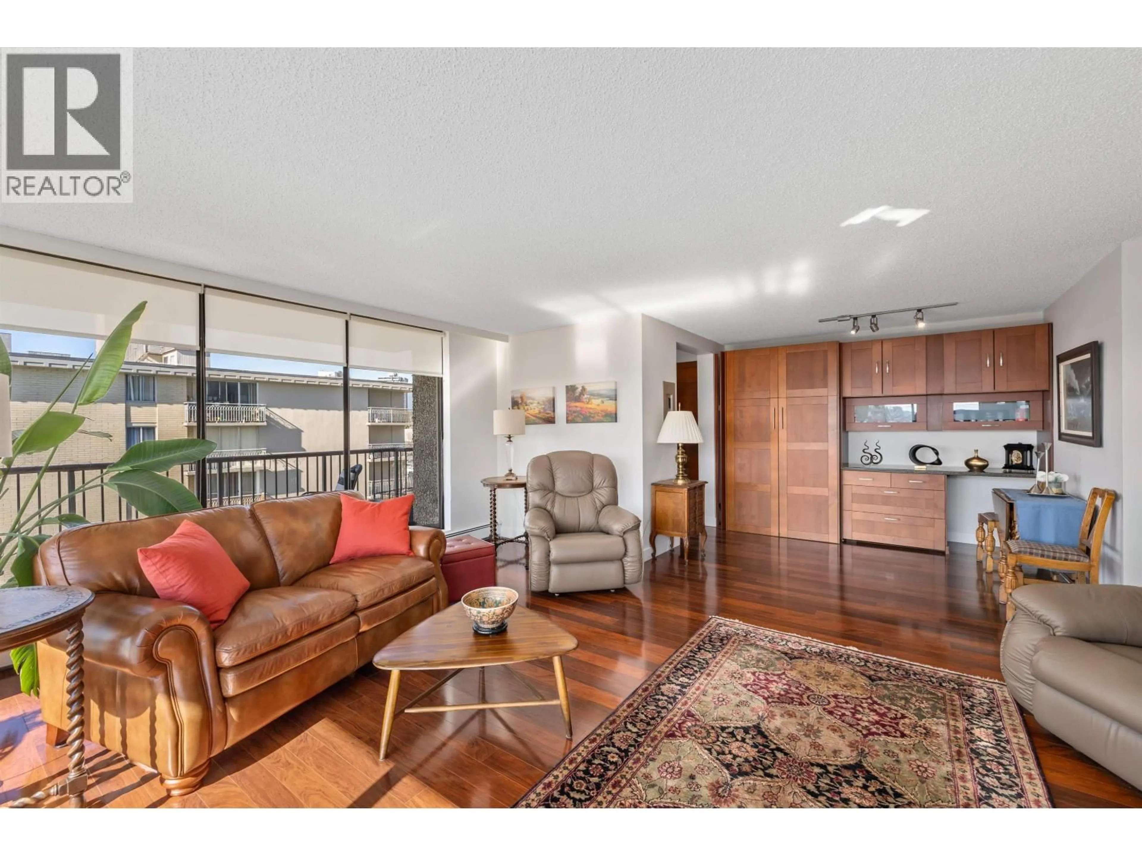 Living room with furniture, wood/laminate floor for 601 - 140 KEITH ROAD, North Vancouver British Columbia V7L4M9