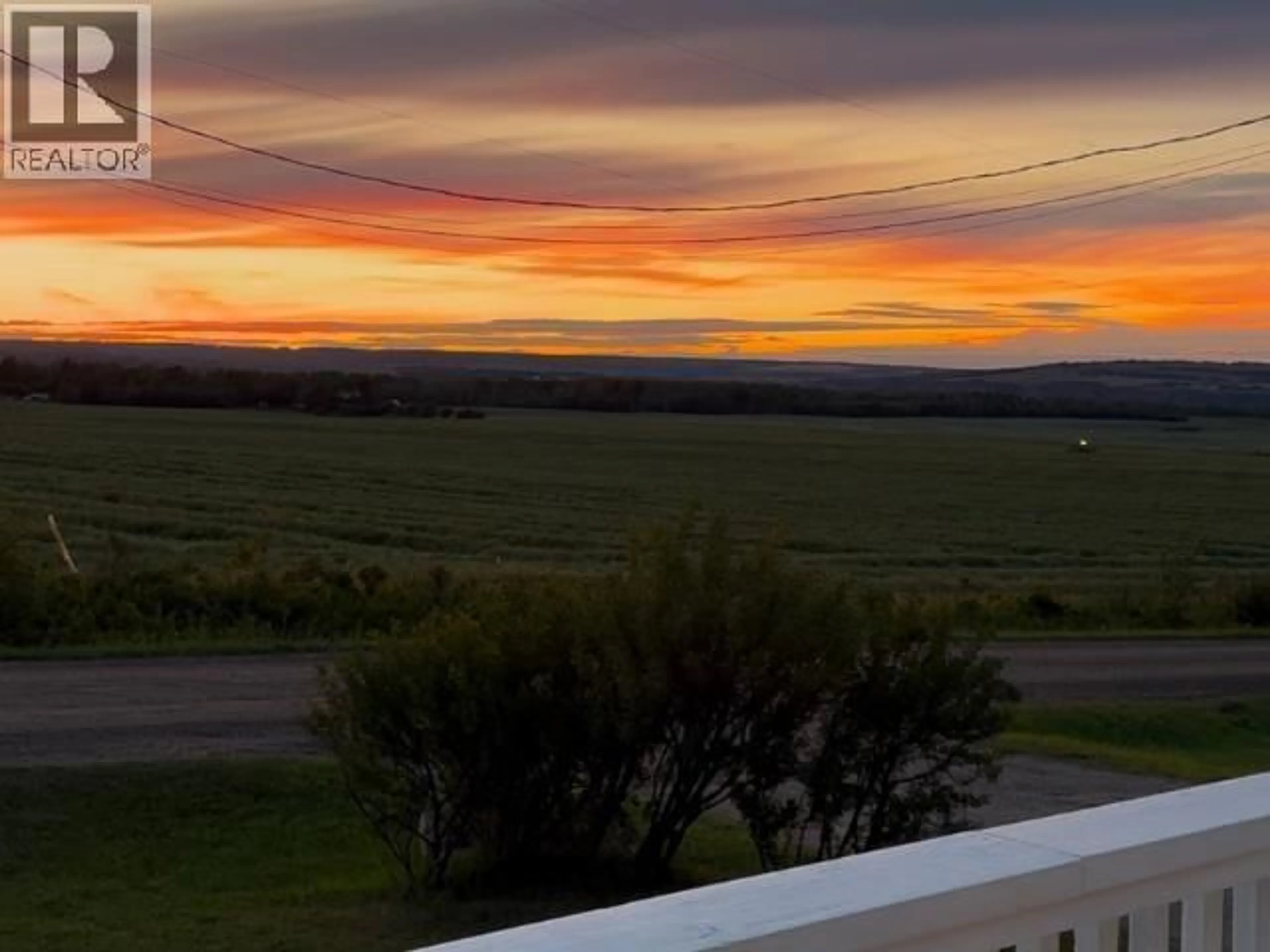 A pic from outside/outdoor area/front of a property/back of a property/a pic from drone, mountain view for 11075 257 ROAD, Fort St. John British Columbia V1J8C2