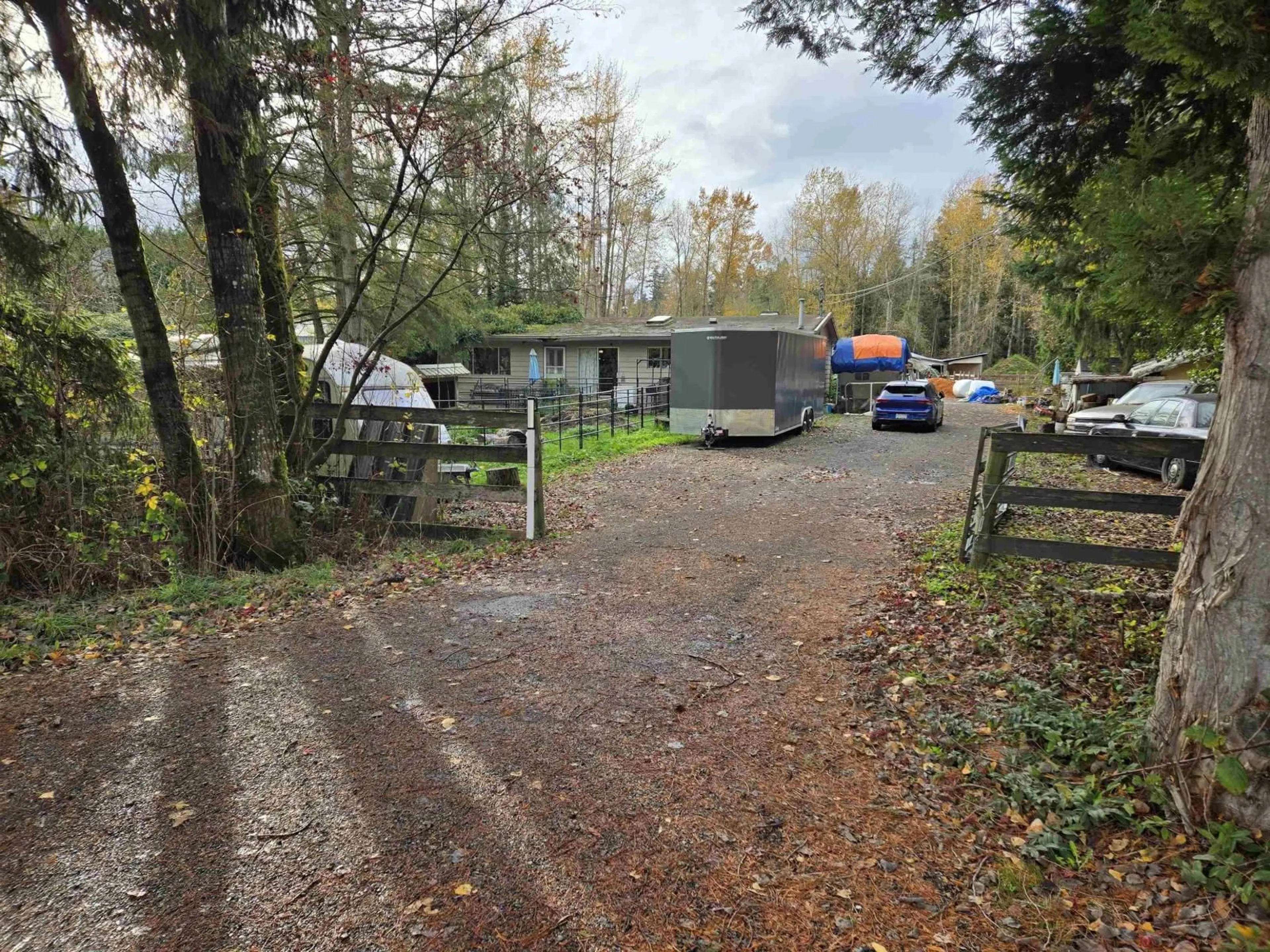 A pic from outside/outdoor area/front of a property/back of a property/a pic from drone, forest/trees view for 2617 208 STREET, Langley British Columbia V2Z2B1