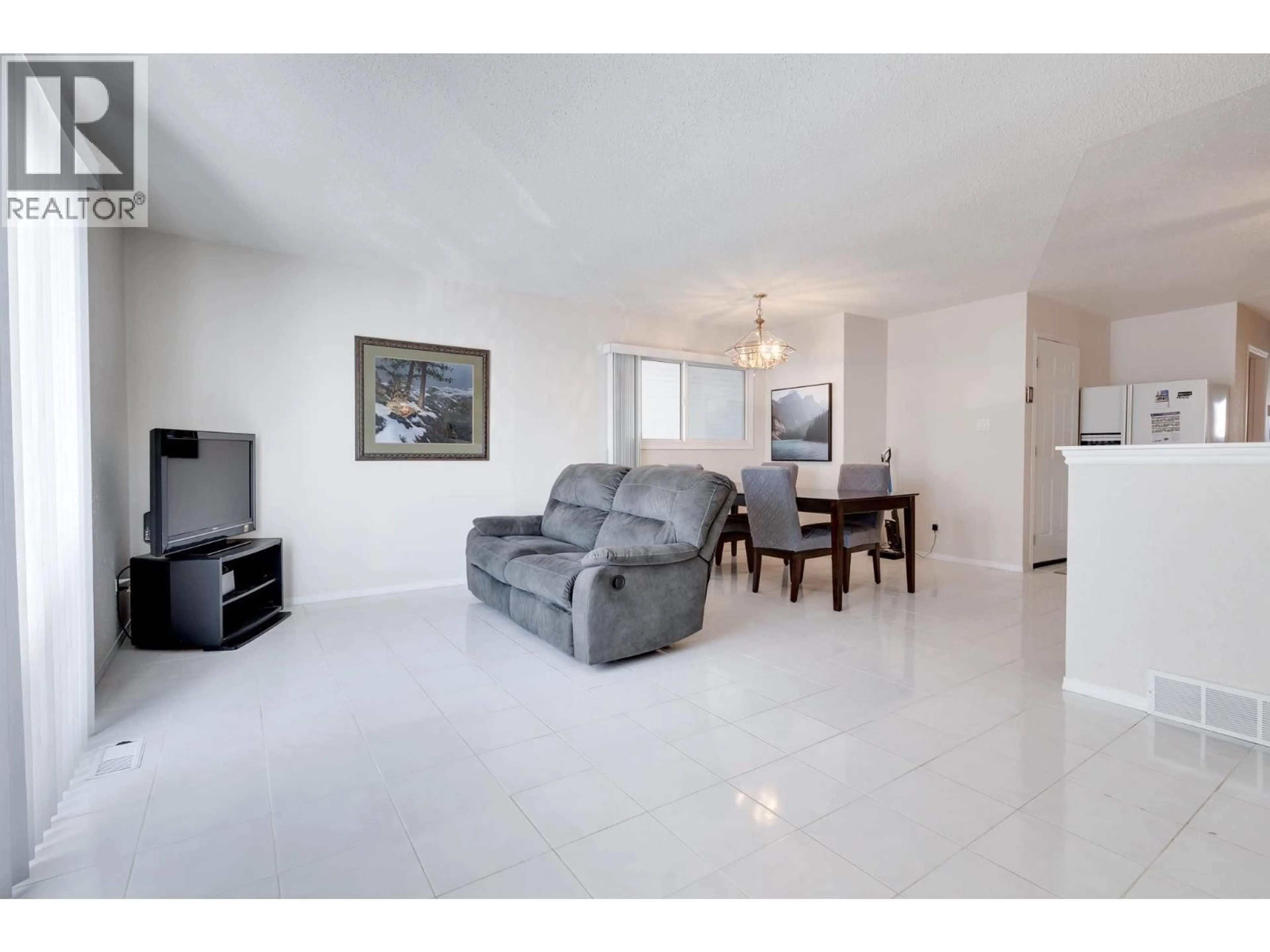 Living room with furniture, ceramic/tile floor for 2109 QUINCE STREET, Prince George British Columbia V2L2H2