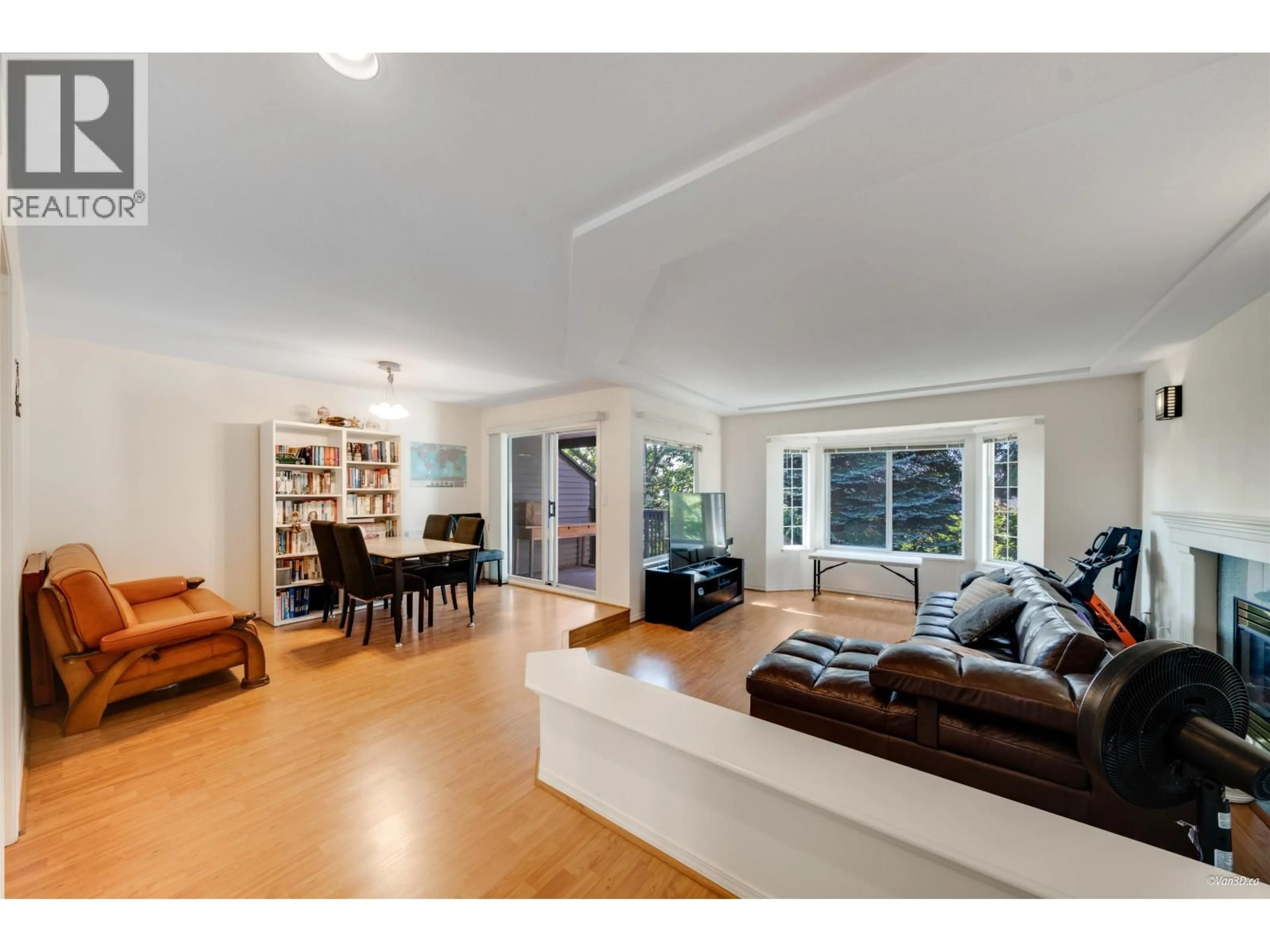 Living room with furniture, wood/laminate floor for 136 - 1685 PINETREE WAY, Coquitlam British Columbia V3E3A1