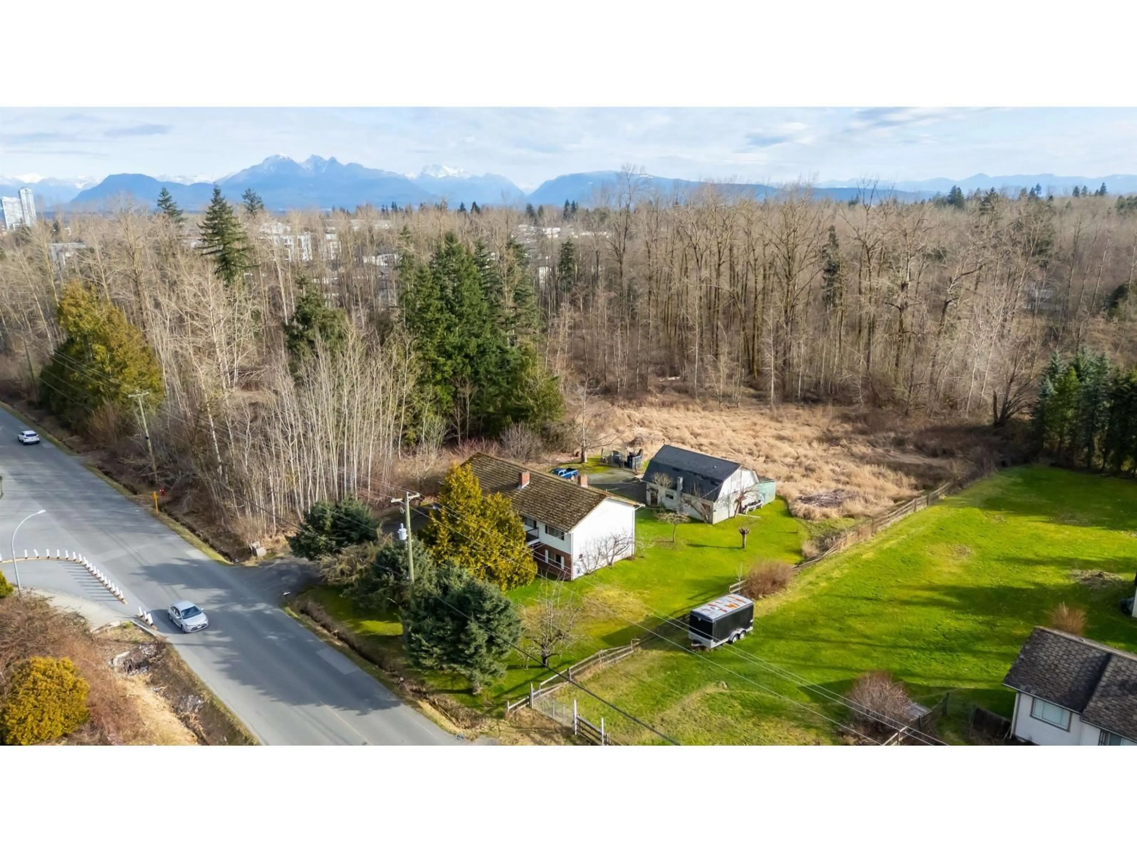 A pic from outside/outdoor area/front of a property/back of a property/a pic from drone, mountain view for 7380 198B STREET, Langley British Columbia V2Y1R9