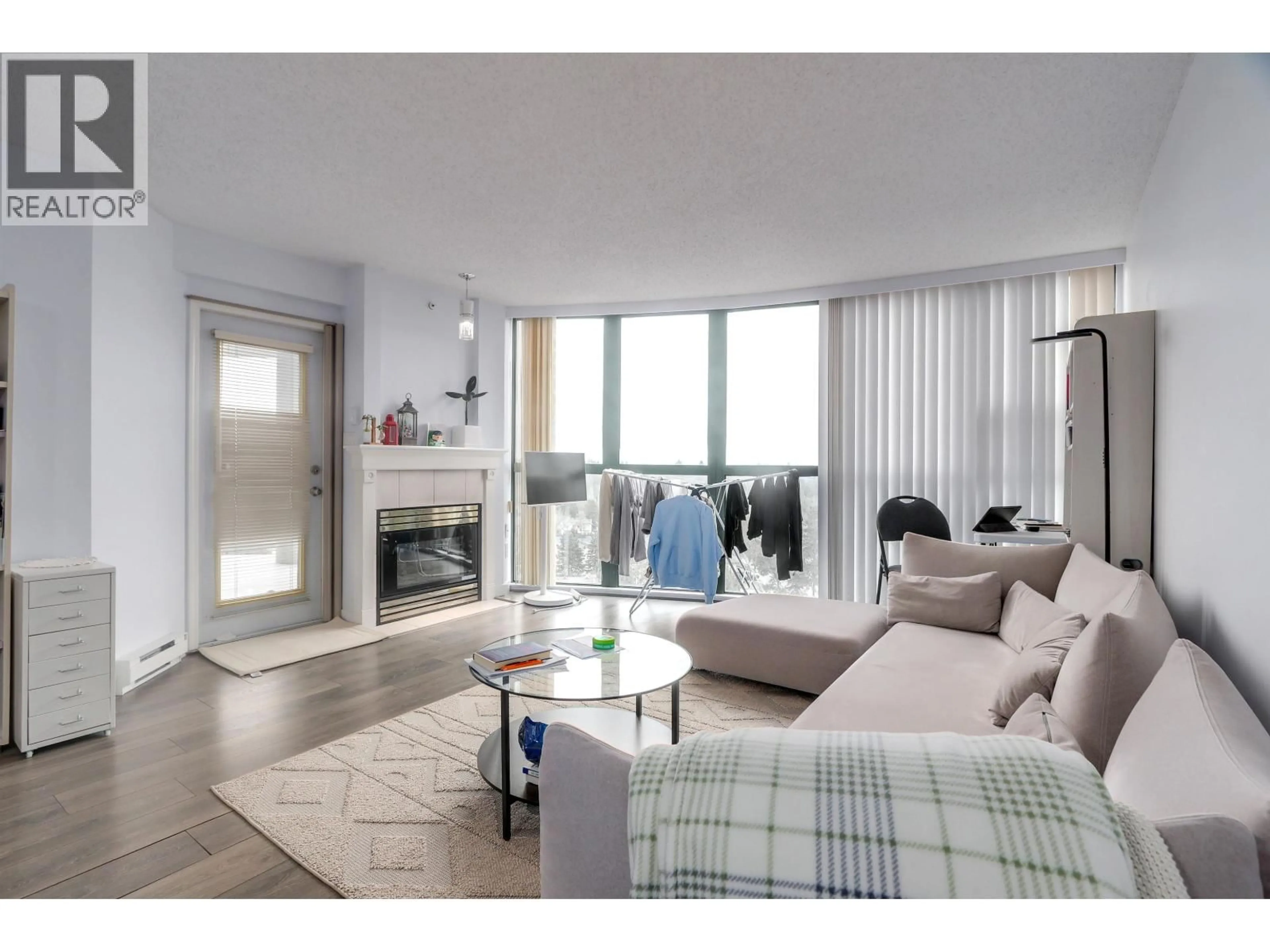 Living room with furniture, unknown for 1004 - 1190 PIPELINE ROAD, Coquitlam British Columbia V3B7T9