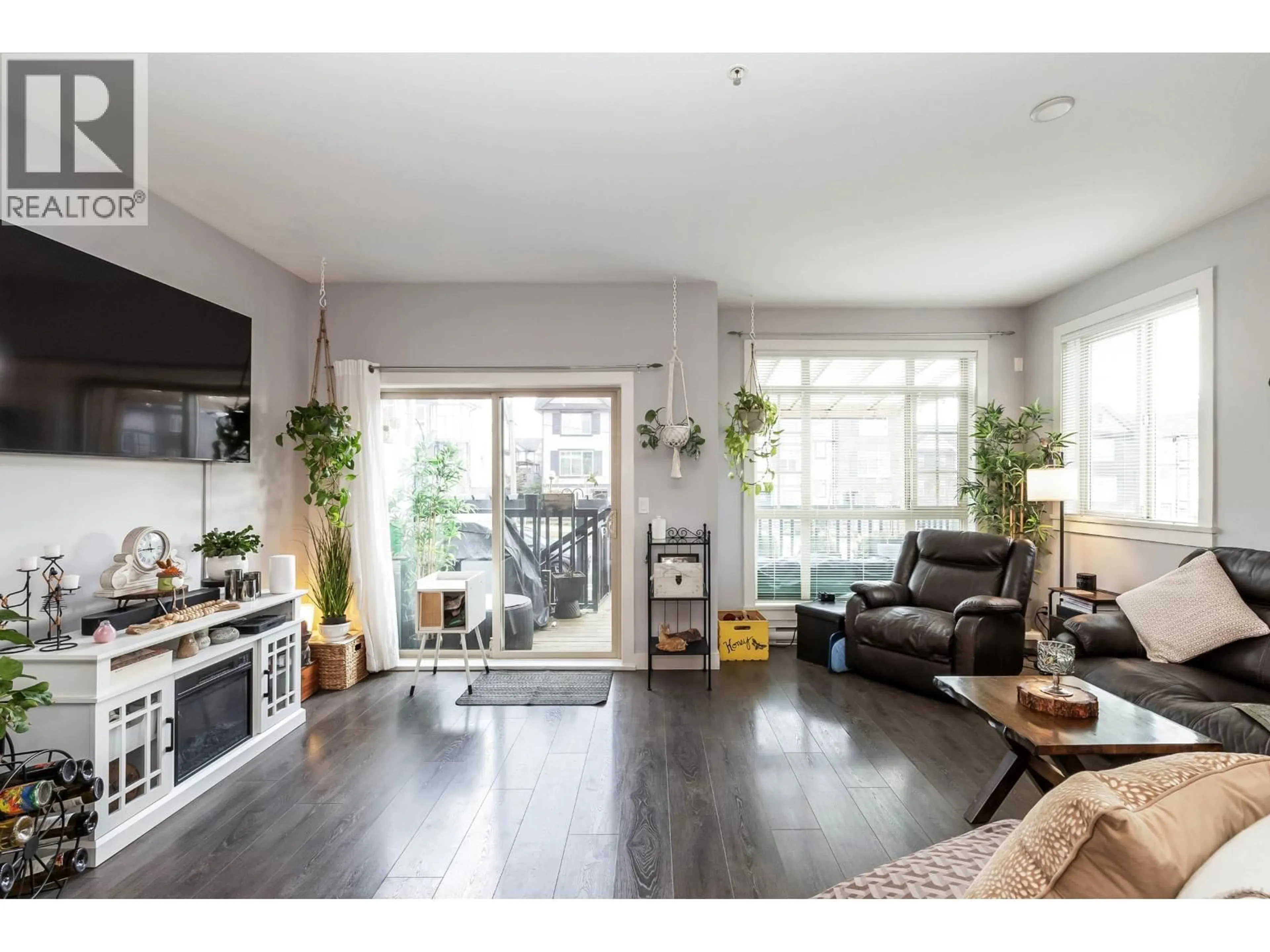 Living room with furniture, wood/laminate floor for 18 - 11305 240 STREET, Maple Ridge British Columbia V2W0J1