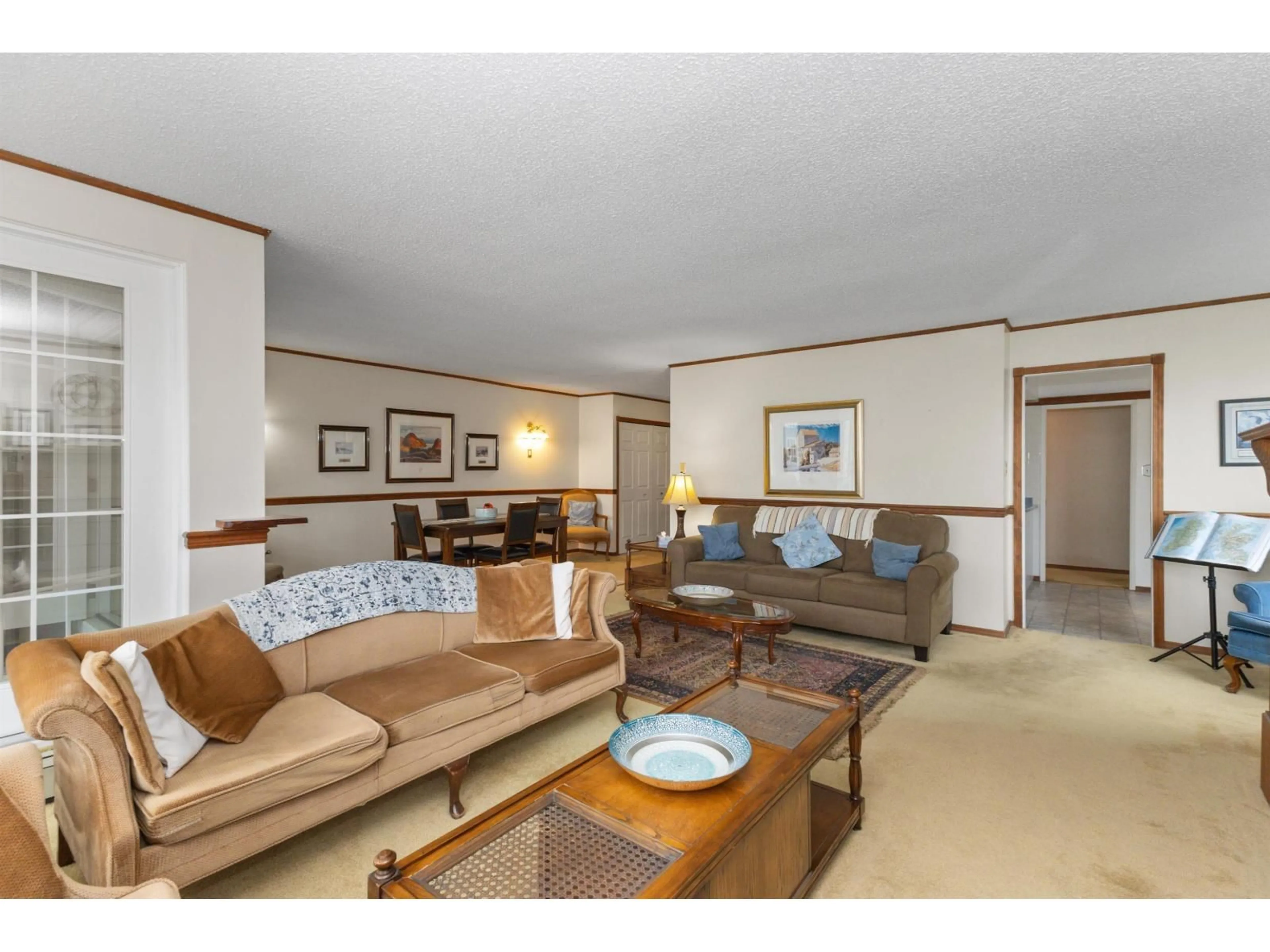 Living room with furniture, unknown for 302 - 32098 GEORGE FERGUSON WAY, Abbotsford British Columbia V2T2K6
