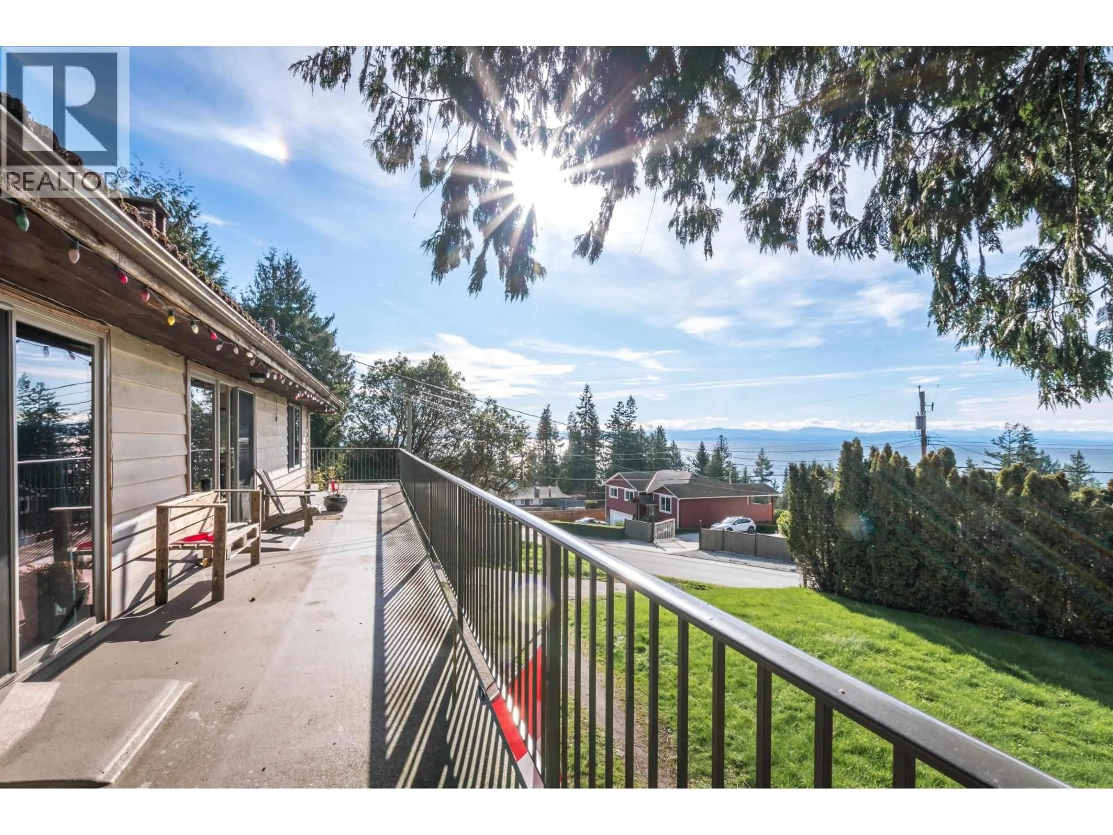 A pic from outside/outdoor area/front of a property/back of a property/a pic from drone, water/lake/river/ocean view for 4902 LAUREL AVENUE, Sechelt British Columbia V7Z0B7