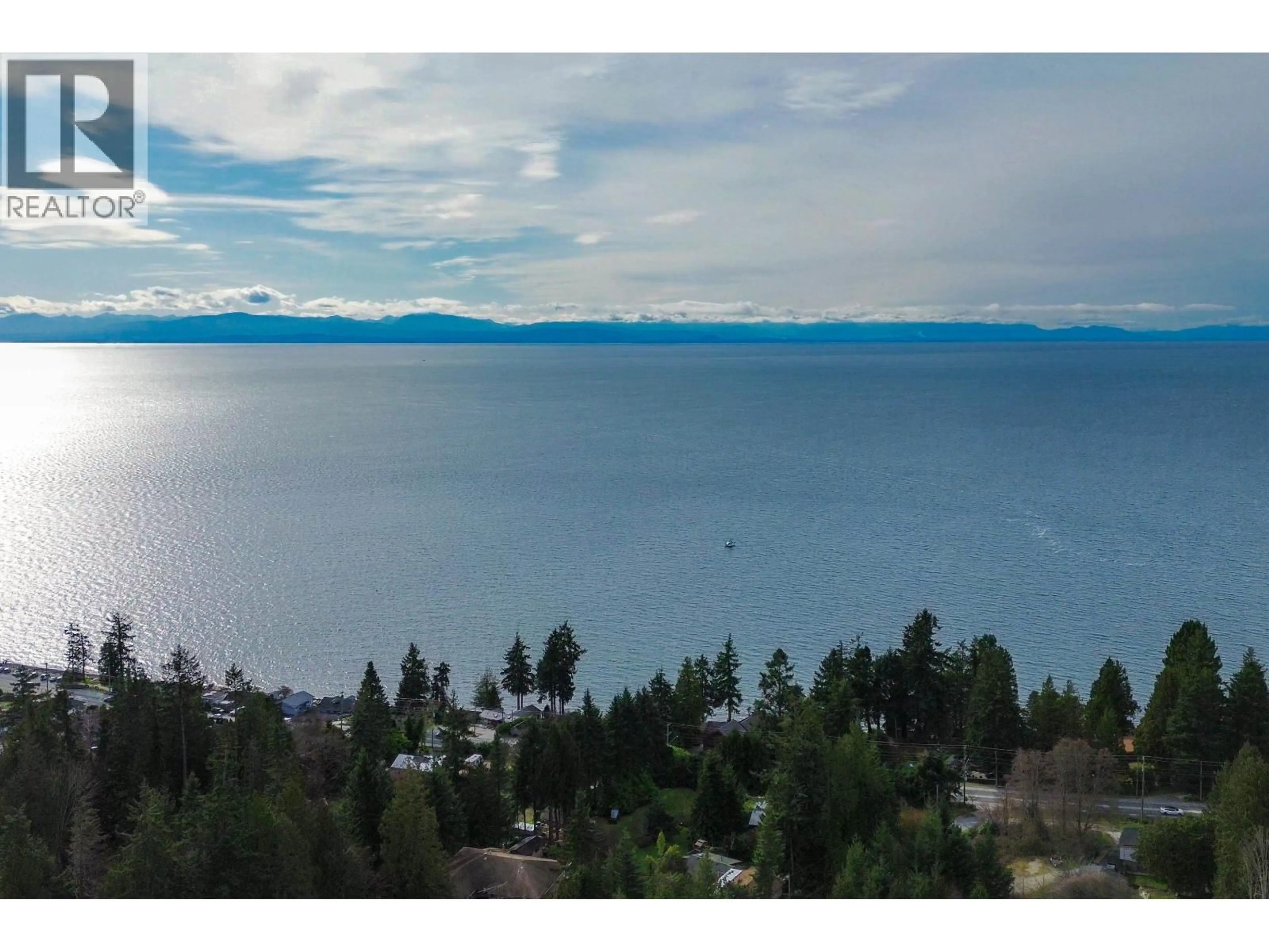 A pic from outside/outdoor area/front of a property/back of a property/a pic from drone, water/lake/river/ocean view for 4902 LAUREL AVENUE, Sechelt British Columbia V7Z0B7
