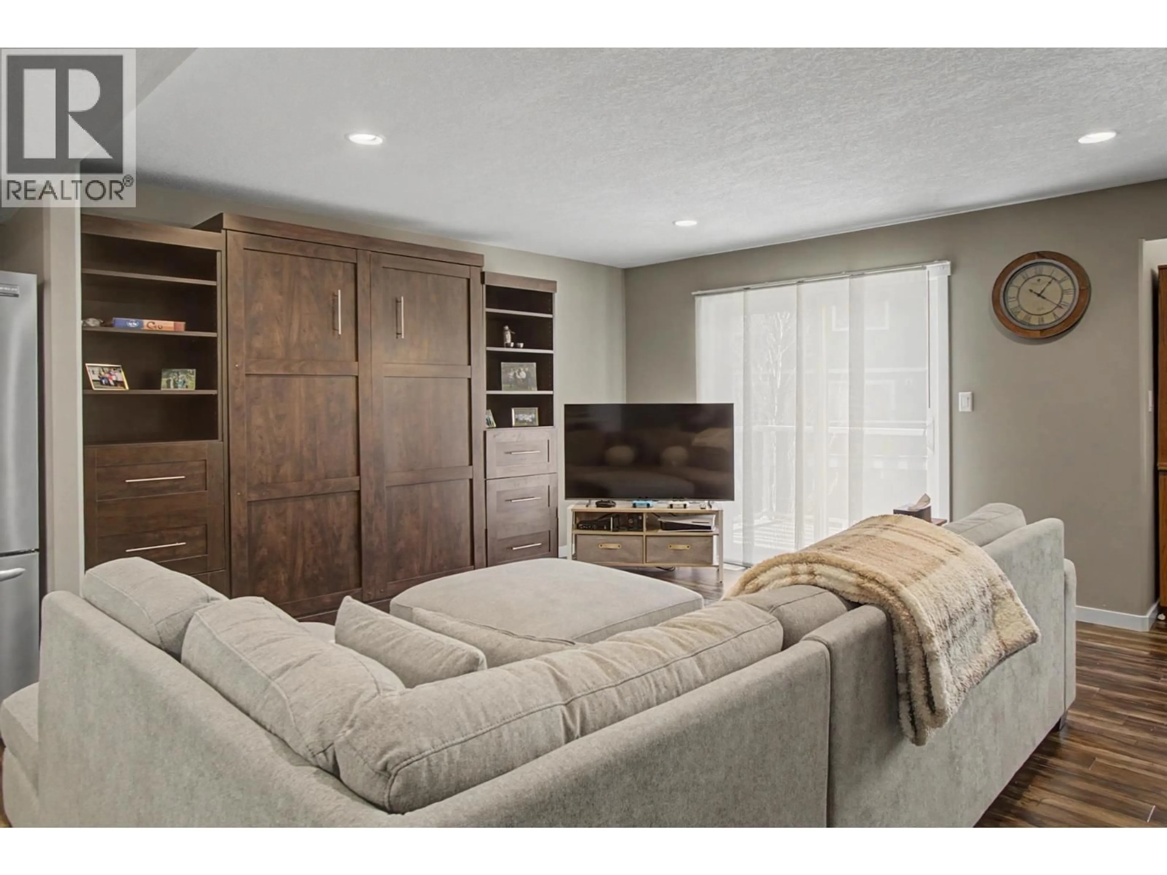 Living room with furniture, unknown for 201 - 7400 CREEKSIDE WAY, Prince George British Columbia V2N0C2