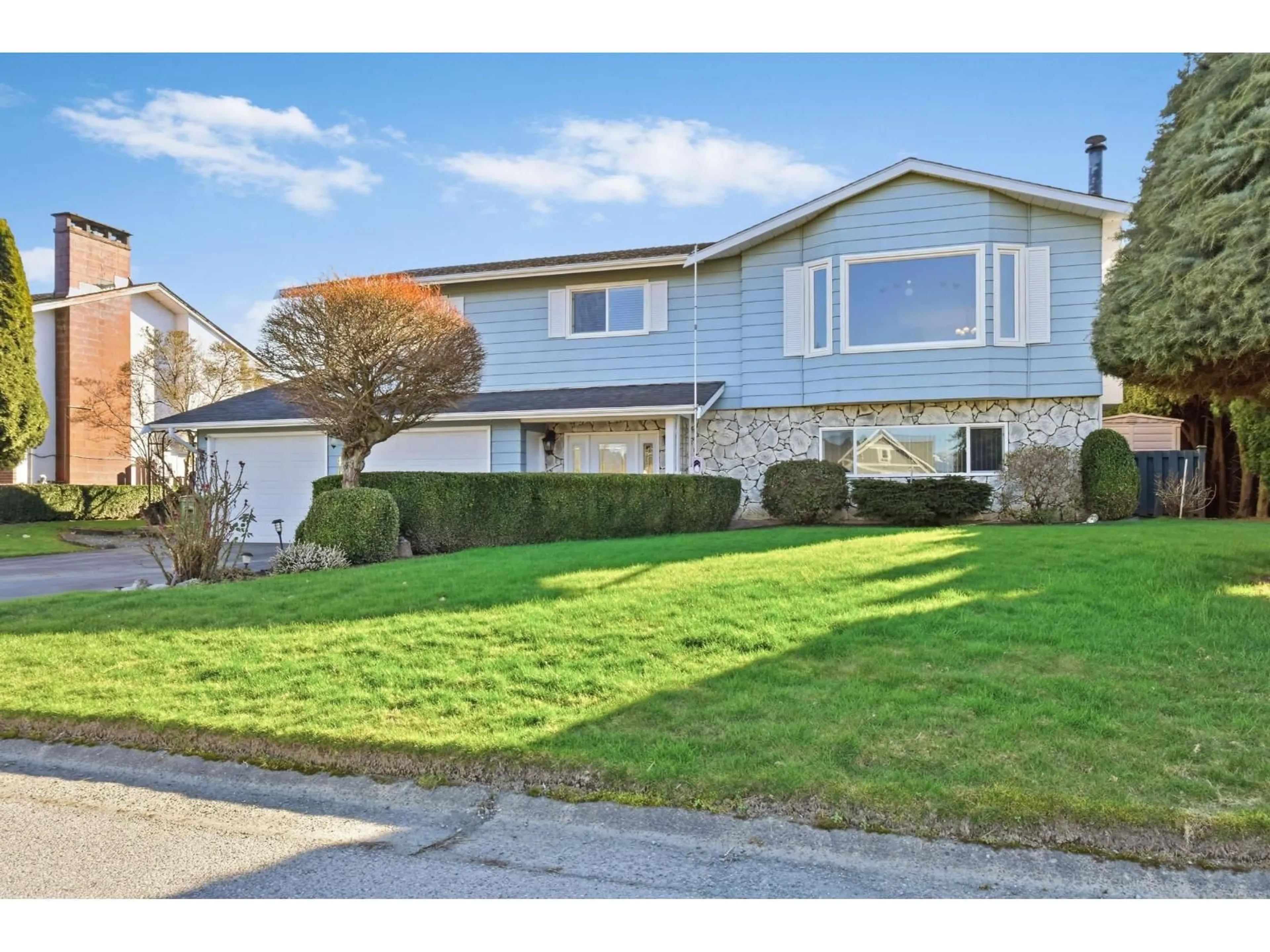 Home with vinyl exterior material, street for 46464 BRICE ROAD, Chilliwack British Columbia V2P3V5