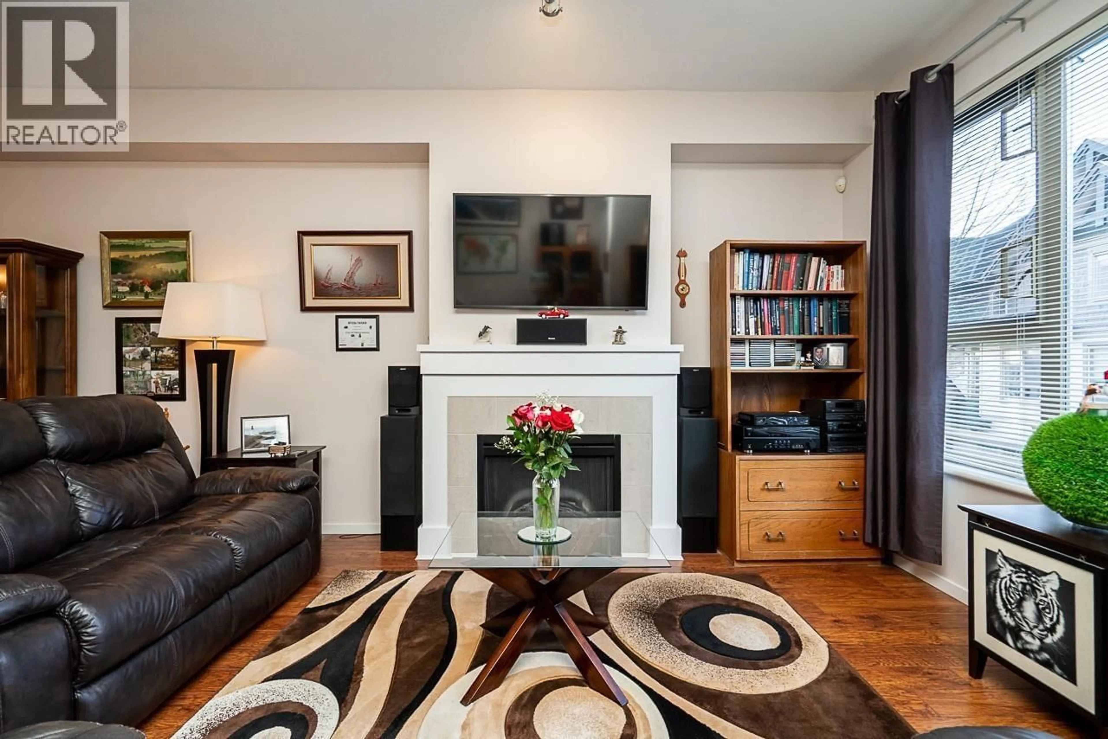 Living room with furniture, wood/laminate floor for 57 - 1370 PURCELL DRIVE, Coquitlam British Columbia V3E0A5