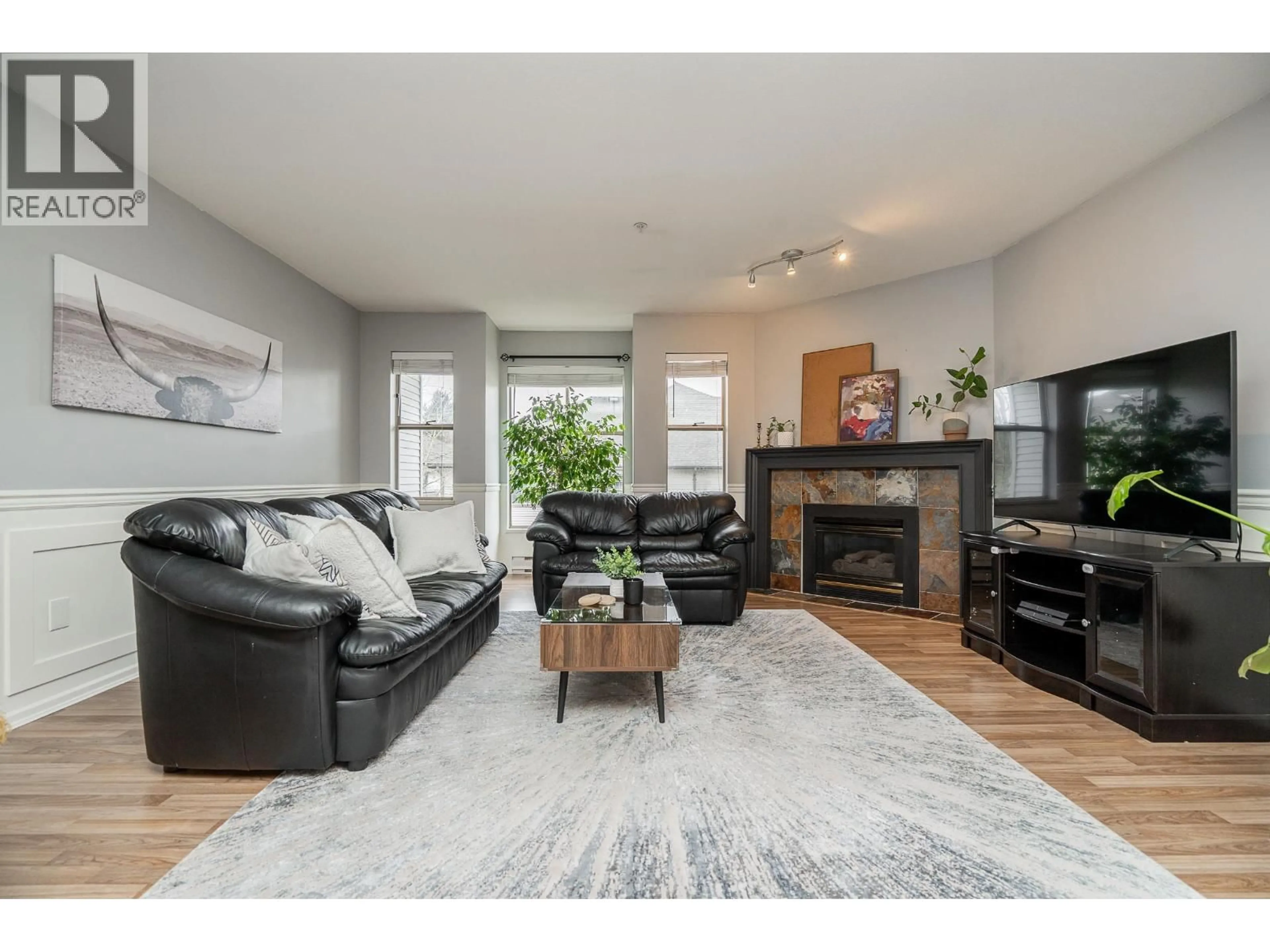 Living room with furniture, wood/laminate floor for 35 - 19160 119 AVENUE, Pitt Meadows British Columbia V3Y2L7