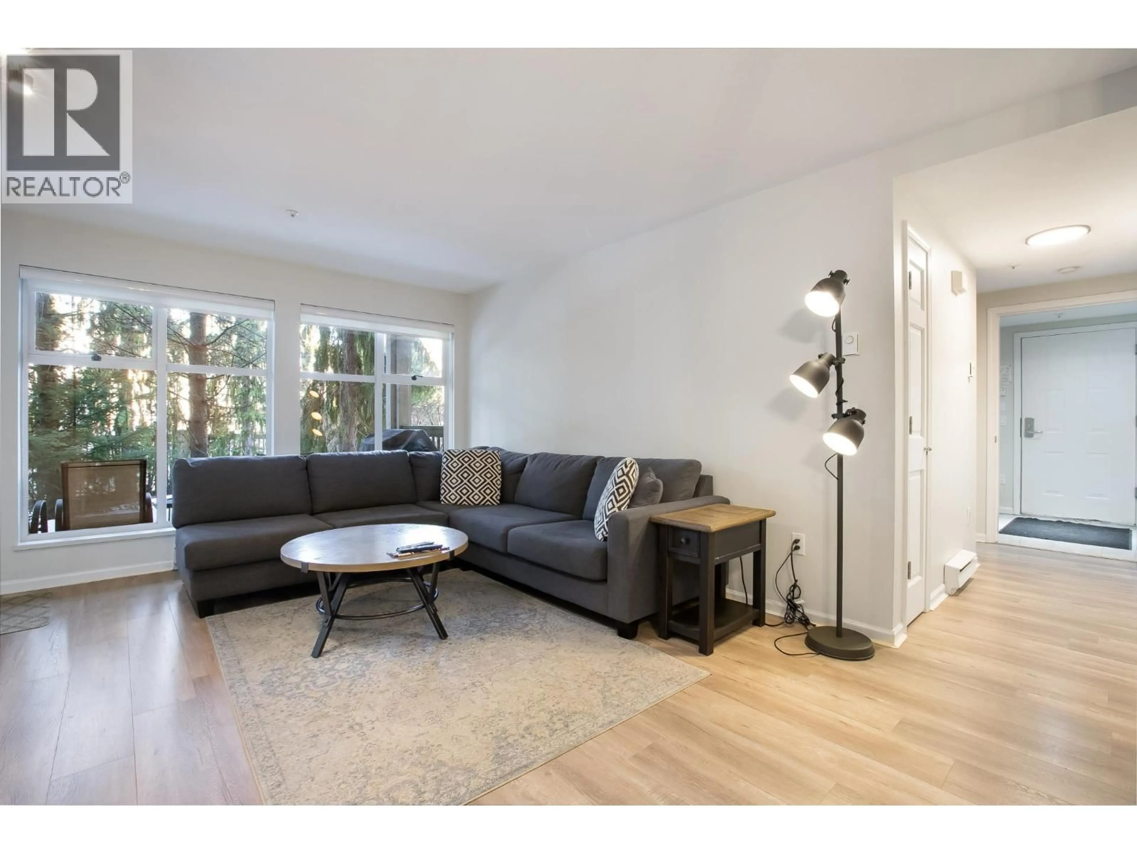 Living room with furniture, wood/laminate floor for 20 - 4355 NORTHLANDS BOULEVARD, Whistler British Columbia V8E1C3