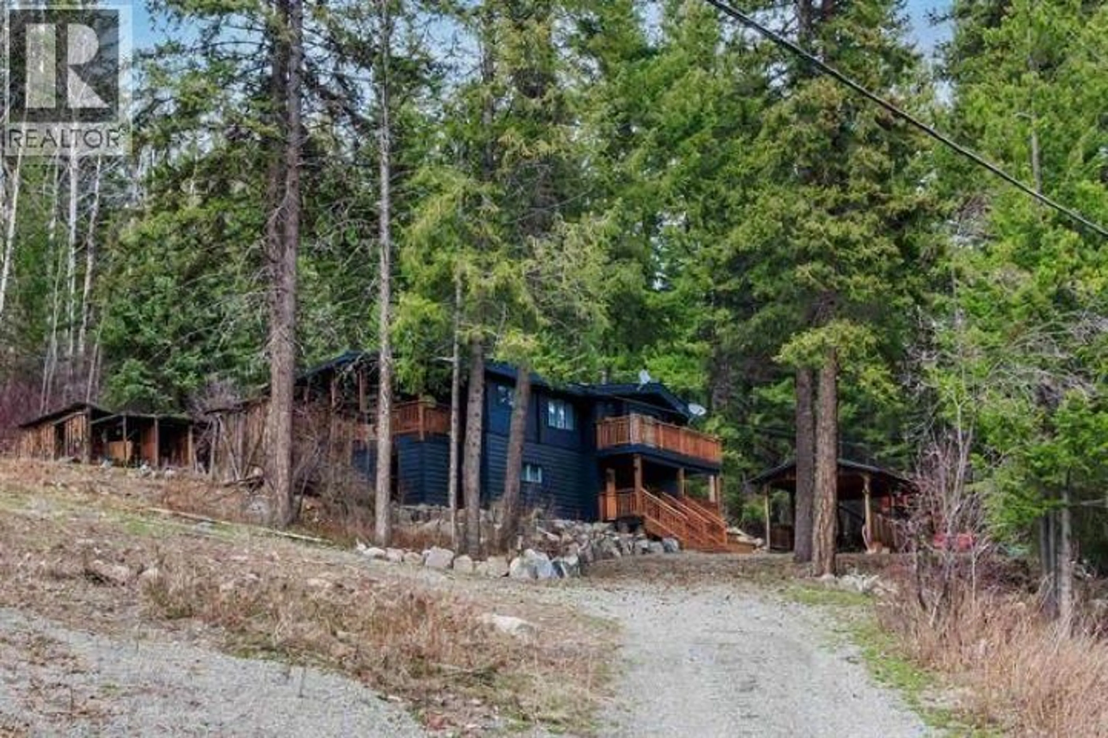 A pic from outside/outdoor area/front of a property/back of a property/a pic from drone, forest/trees view for 6062 MAHOOD LAKE ROAD, 100 Mile House British Columbia V0K1X3