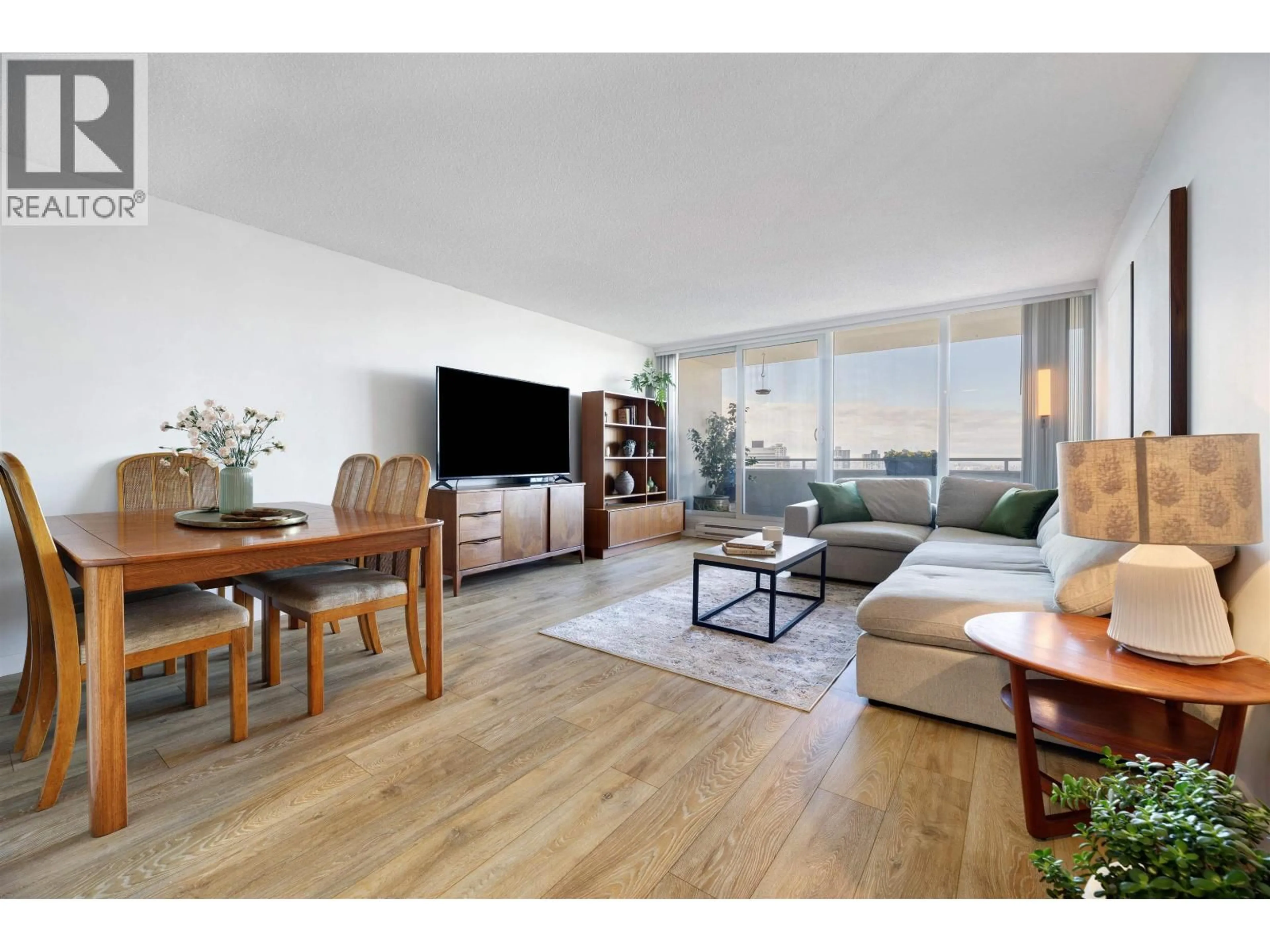 Living room with furniture, wood/laminate floor for 2104 - 5652 PATTERSON AVENUE, Burnaby British Columbia V5H4C8