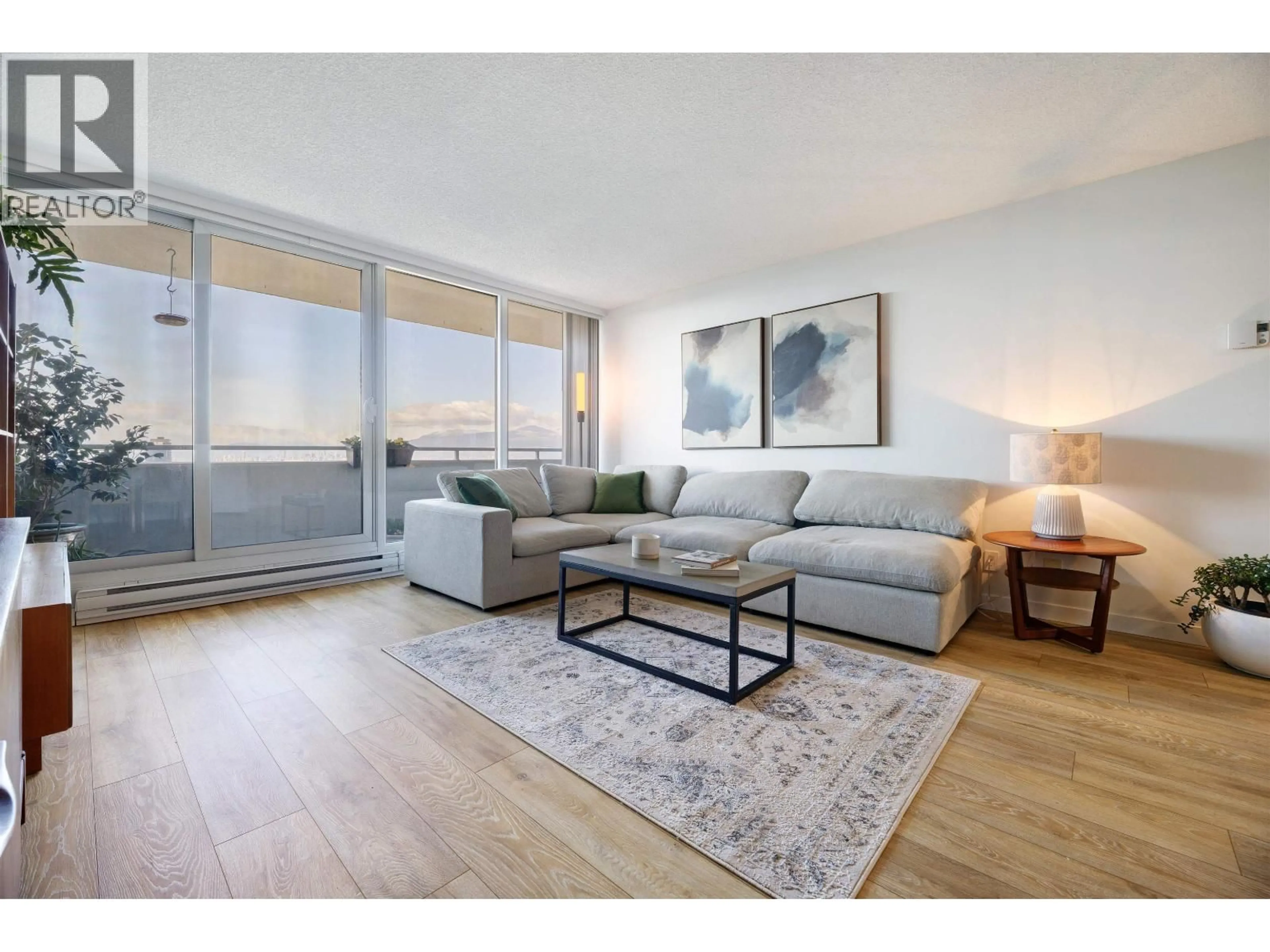 Living room with furniture, wood/laminate floor for 2104 - 5652 PATTERSON AVENUE, Burnaby British Columbia V5H4C8