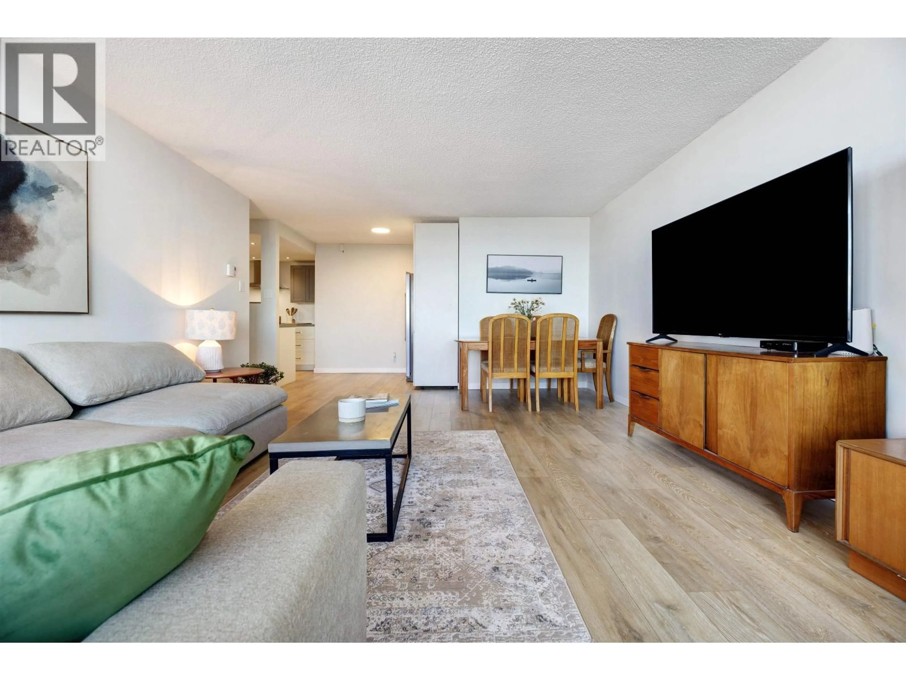 Living room with furniture, wood/laminate floor for 2104 - 5652 PATTERSON AVENUE, Burnaby British Columbia V5H4C8