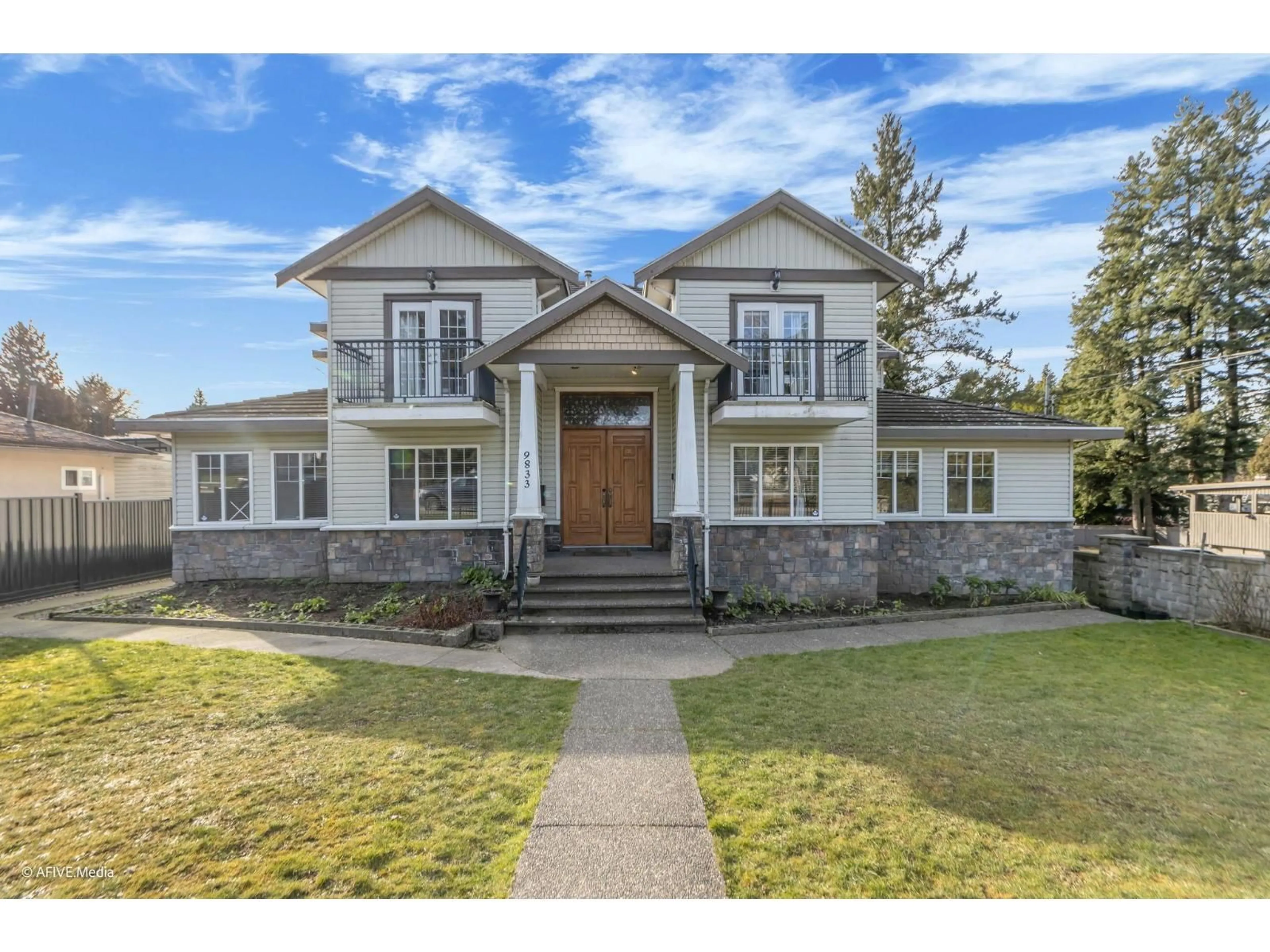 Home with brick exterior material, street for 9833 128 STREET, Surrey British Columbia V3T2Y5