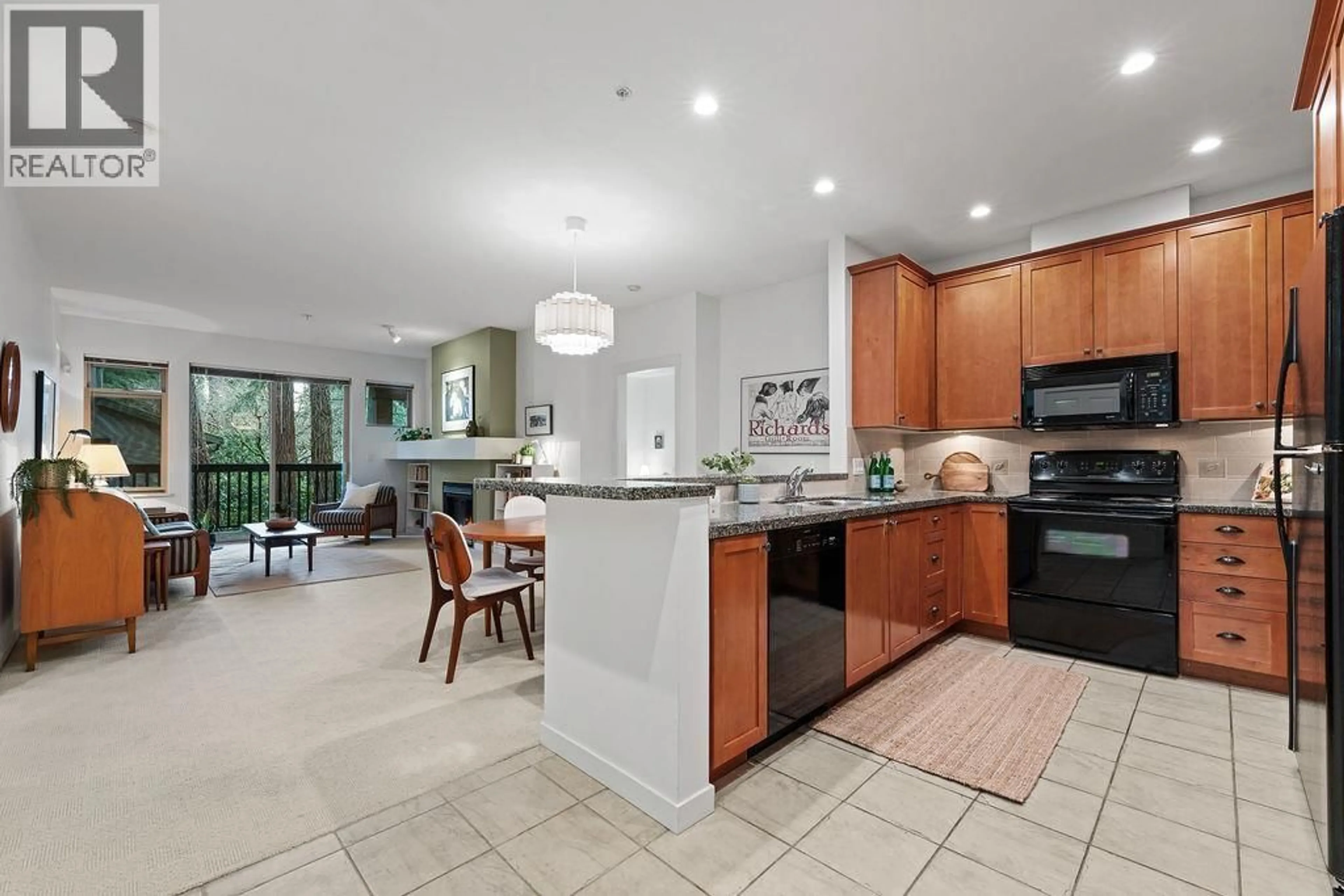 Open concept kitchen, ceramic/tile floor for 106 - 3125 CAPILANO CRESCENT, North Vancouver British Columbia V7R4X5