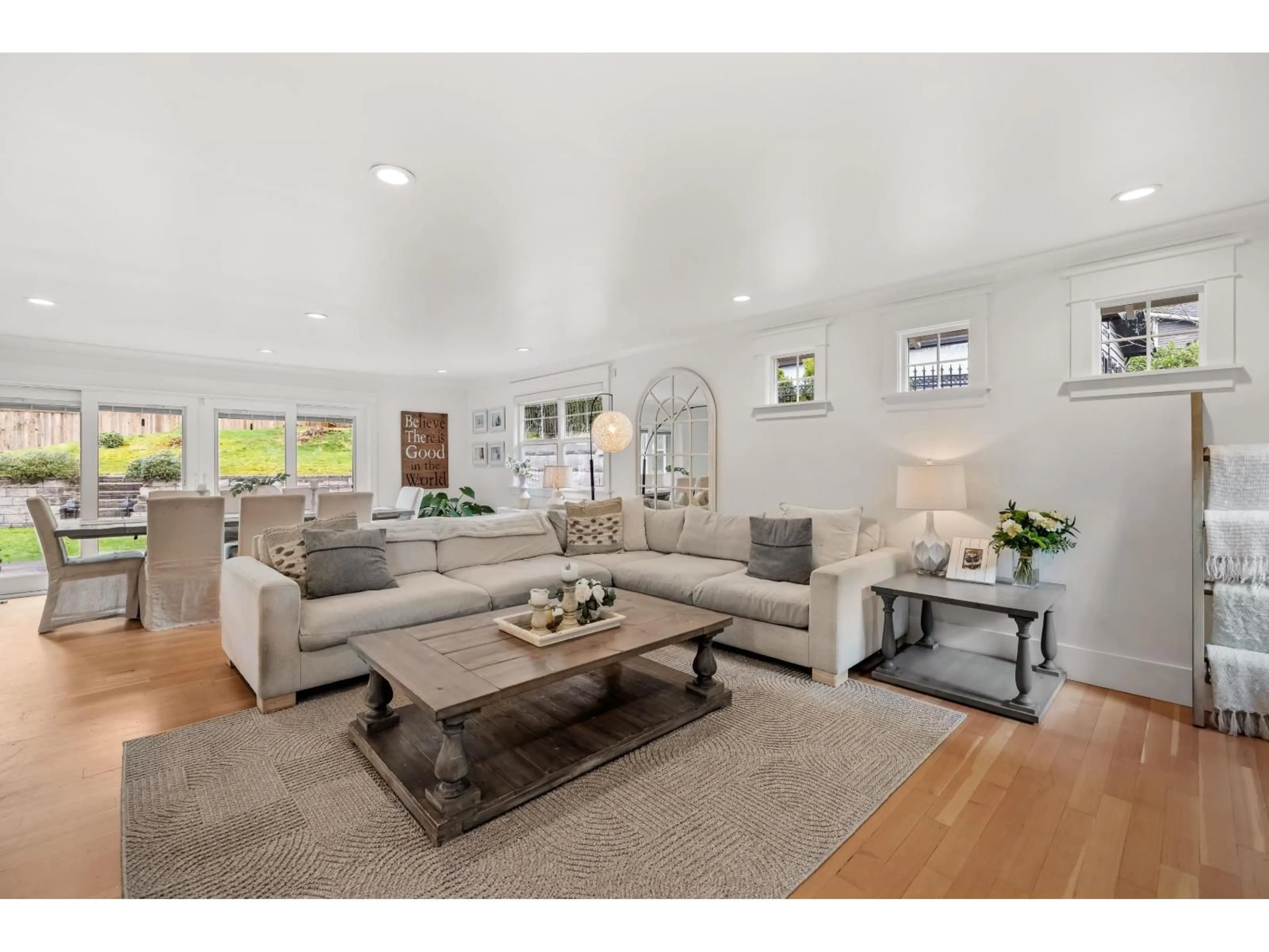 Living room with furniture, wood/laminate floor for 20492 43 AVENUE, Langley British Columbia V3A3C2