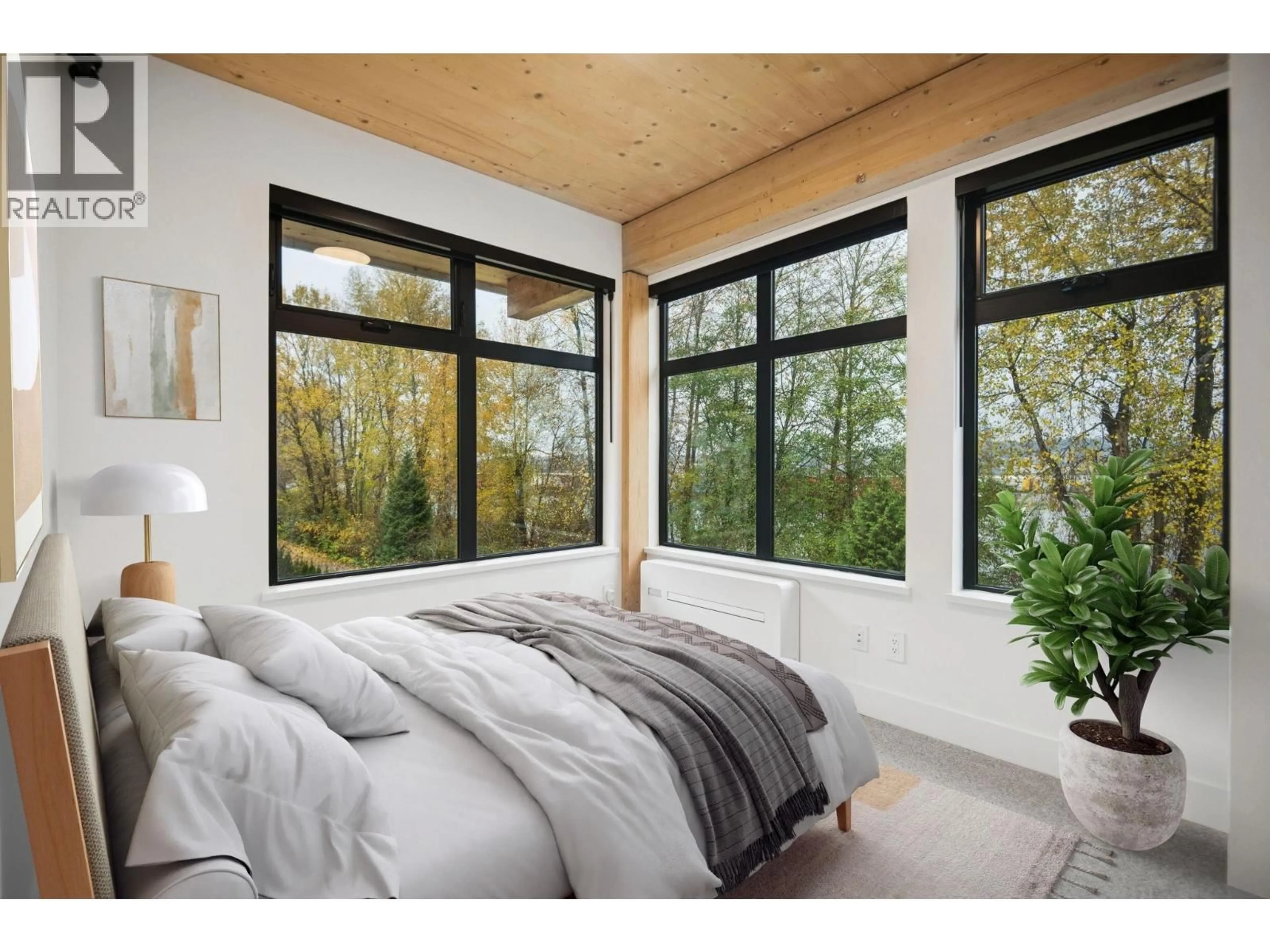 Bedroom with bed, wood/laminate floor for 403 - 310 SALTER STREET, New Westminster British Columbia V3M0N7