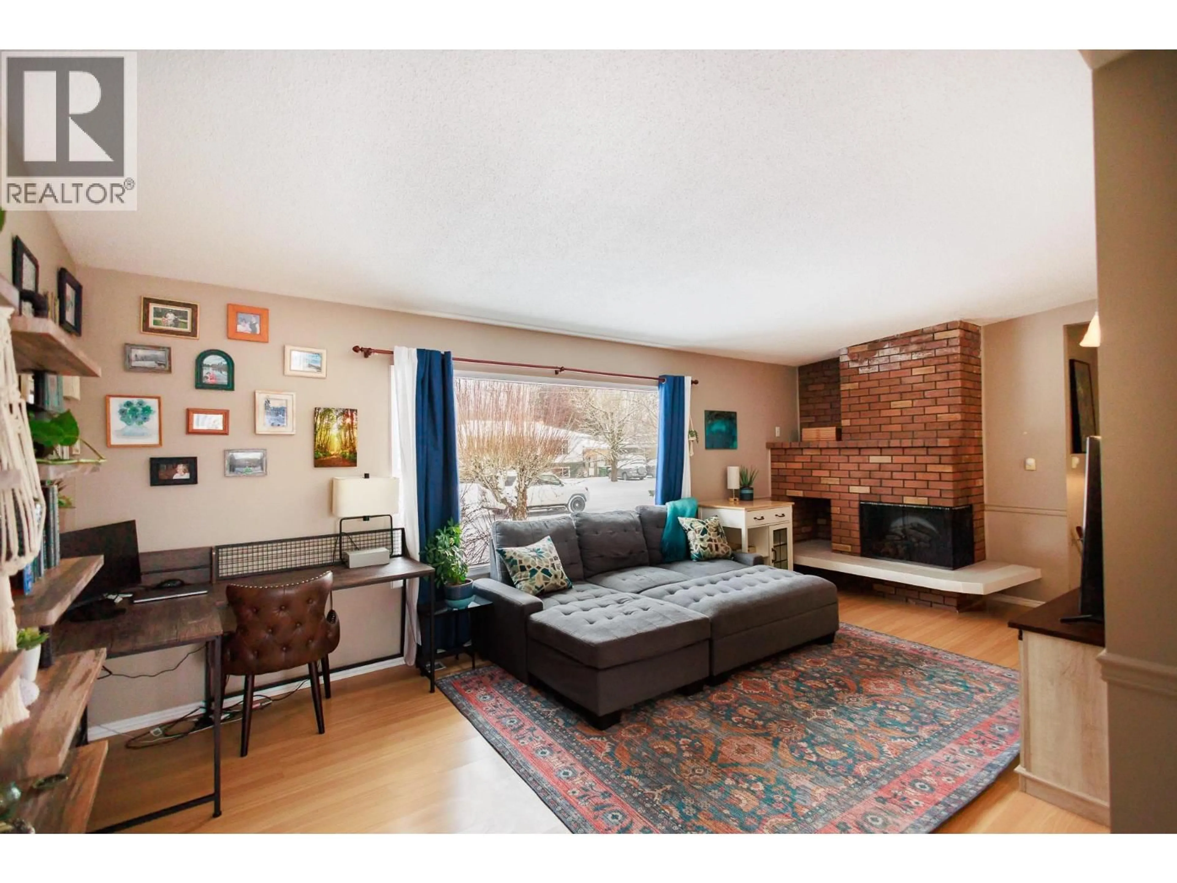Living room with furniture, wood/laminate floor for 4115 BENNER STREET, Terrace British Columbia V8G3B1