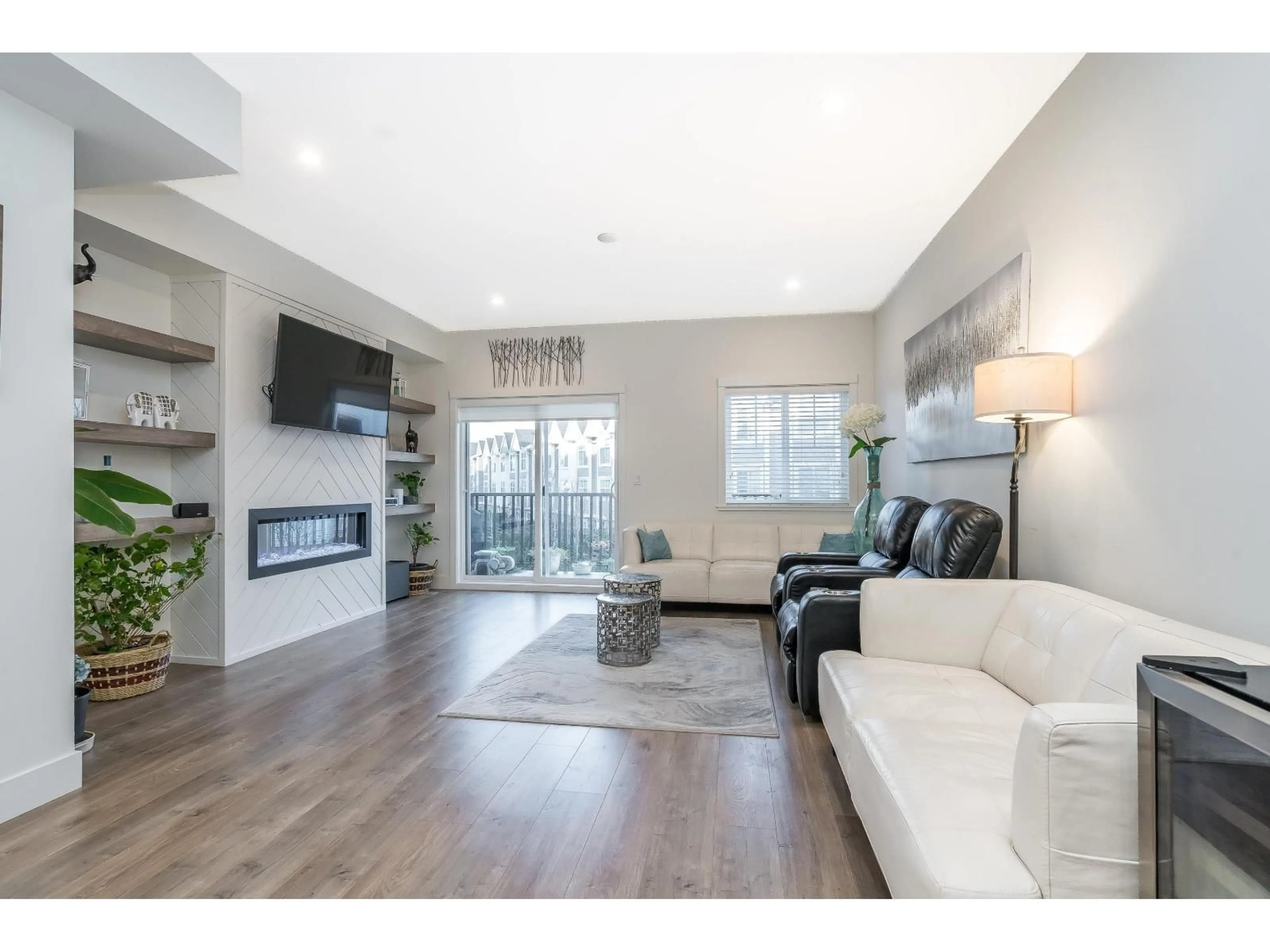 Living room with furniture, wood/laminate floor for 65 - 14541 WINTER CRESCENT, Surrey British Columbia V4P0G5