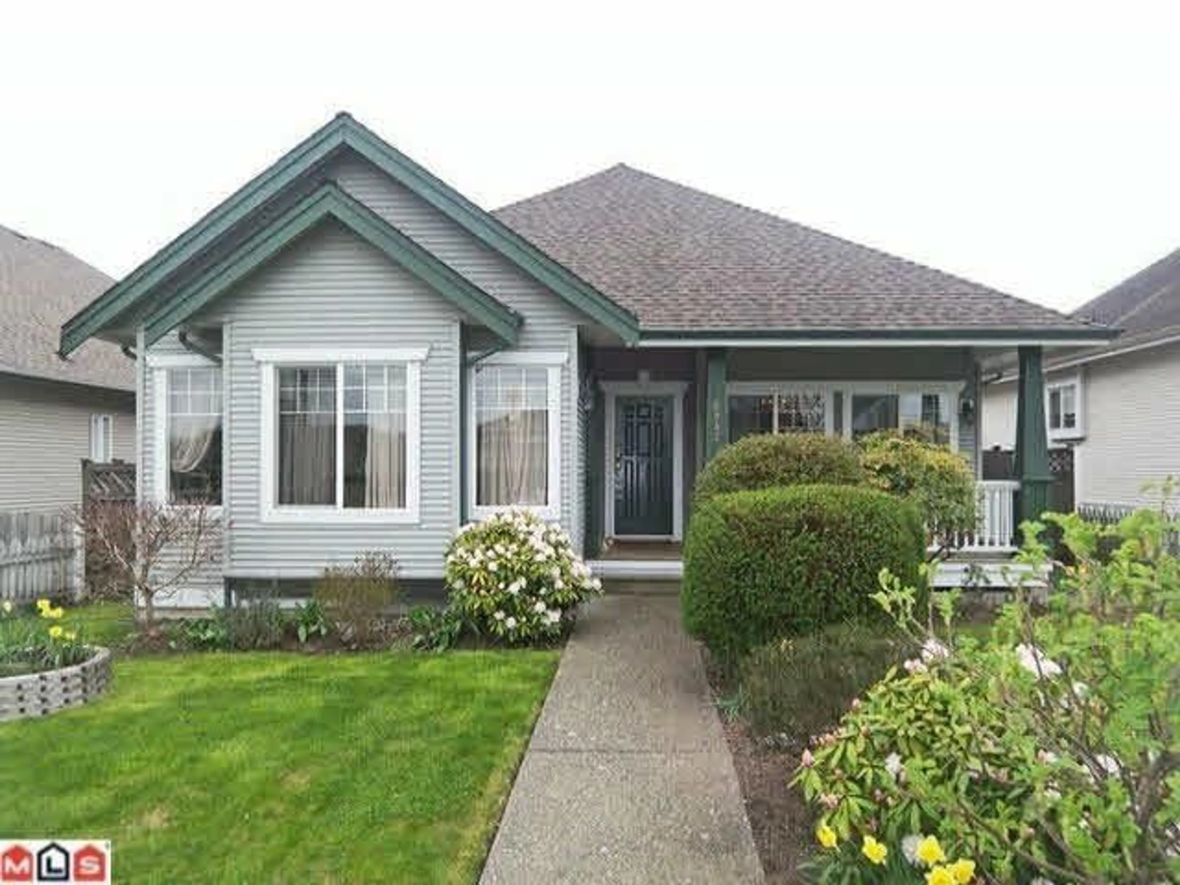 Home with vinyl exterior material, street for 6842 184TH STREET, Surrey British Columbia V3S2J5