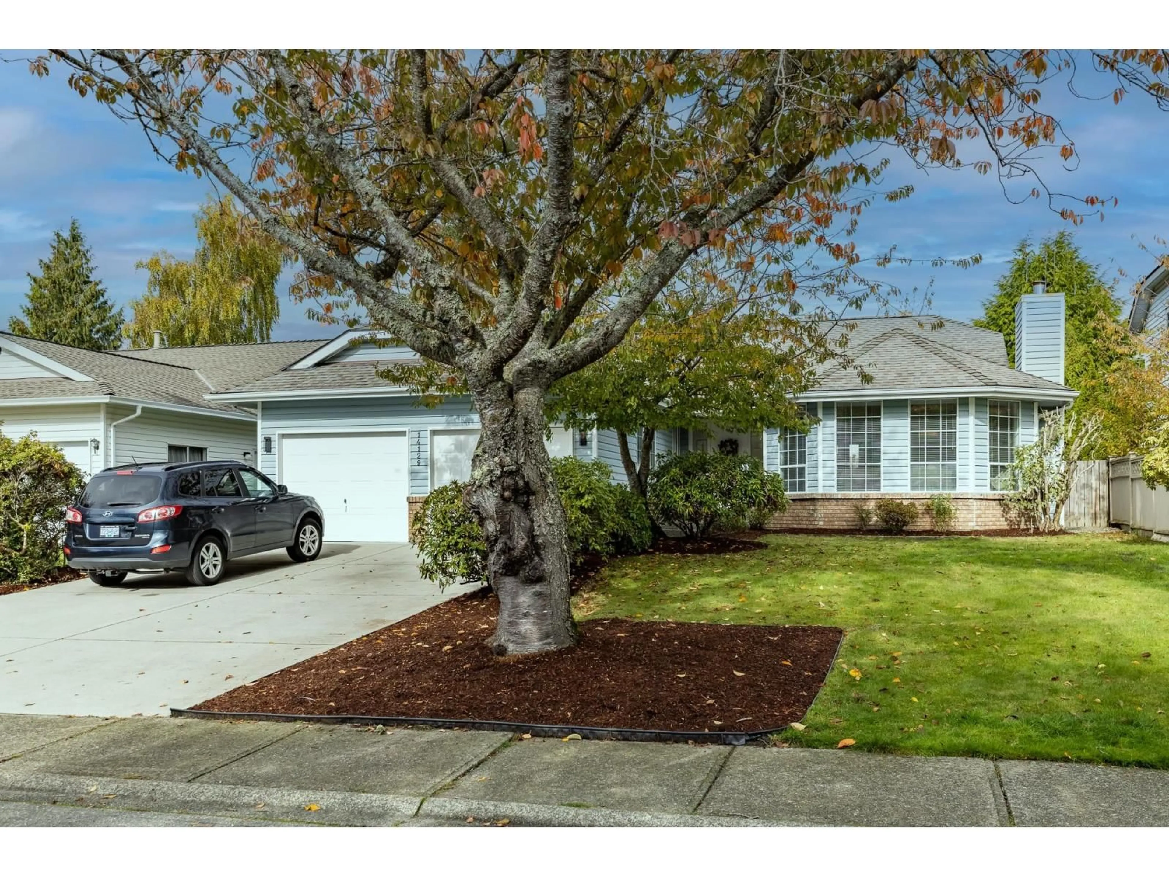 Home with vinyl exterior material, street for 14129 16A AVENUE, Surrey British Columbia V4A8K2