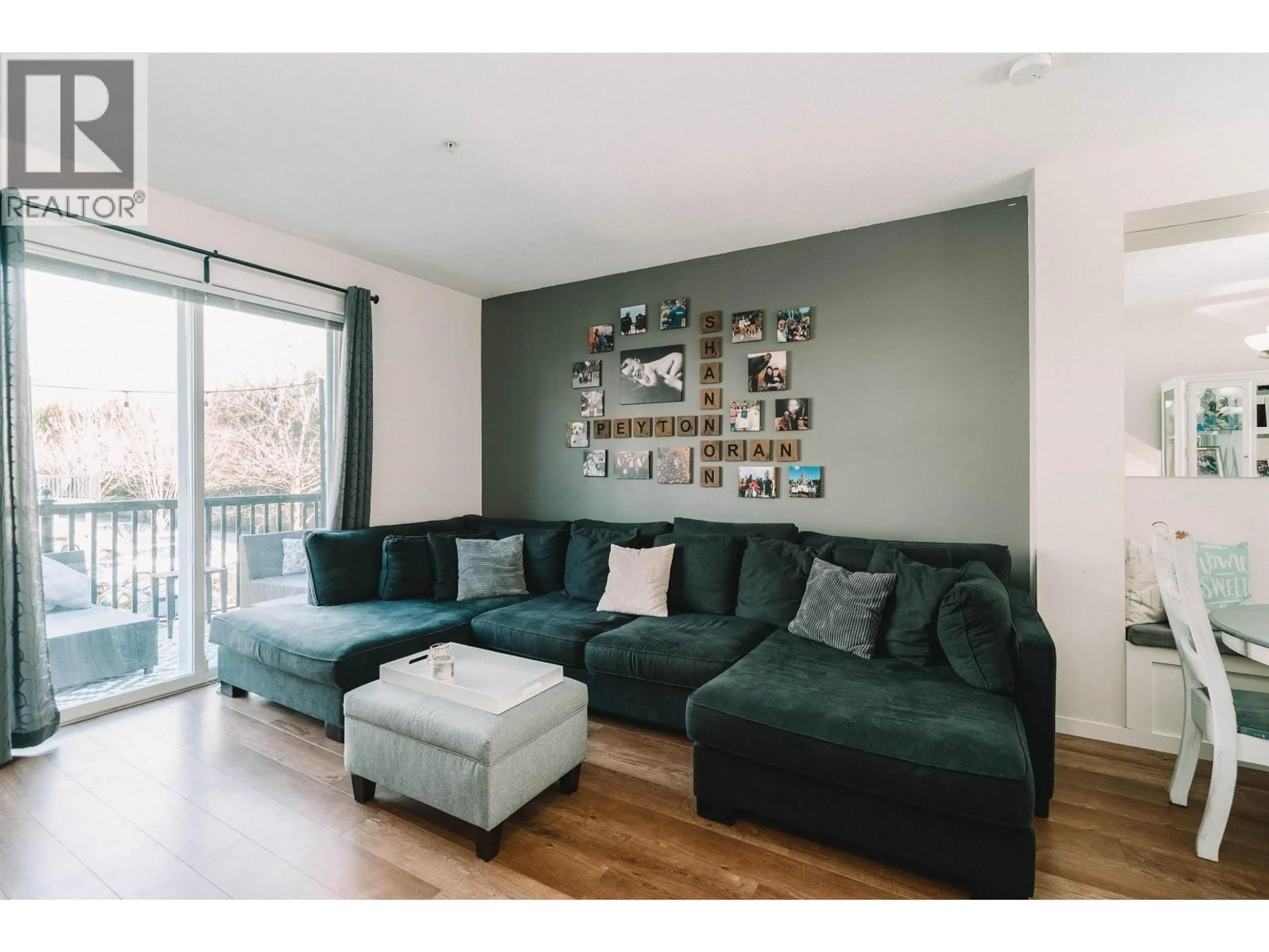 Living room with furniture, wood/laminate floor for 136 - 2418 AVON PLACE, Port Coquitlam British Columbia V3B0C7