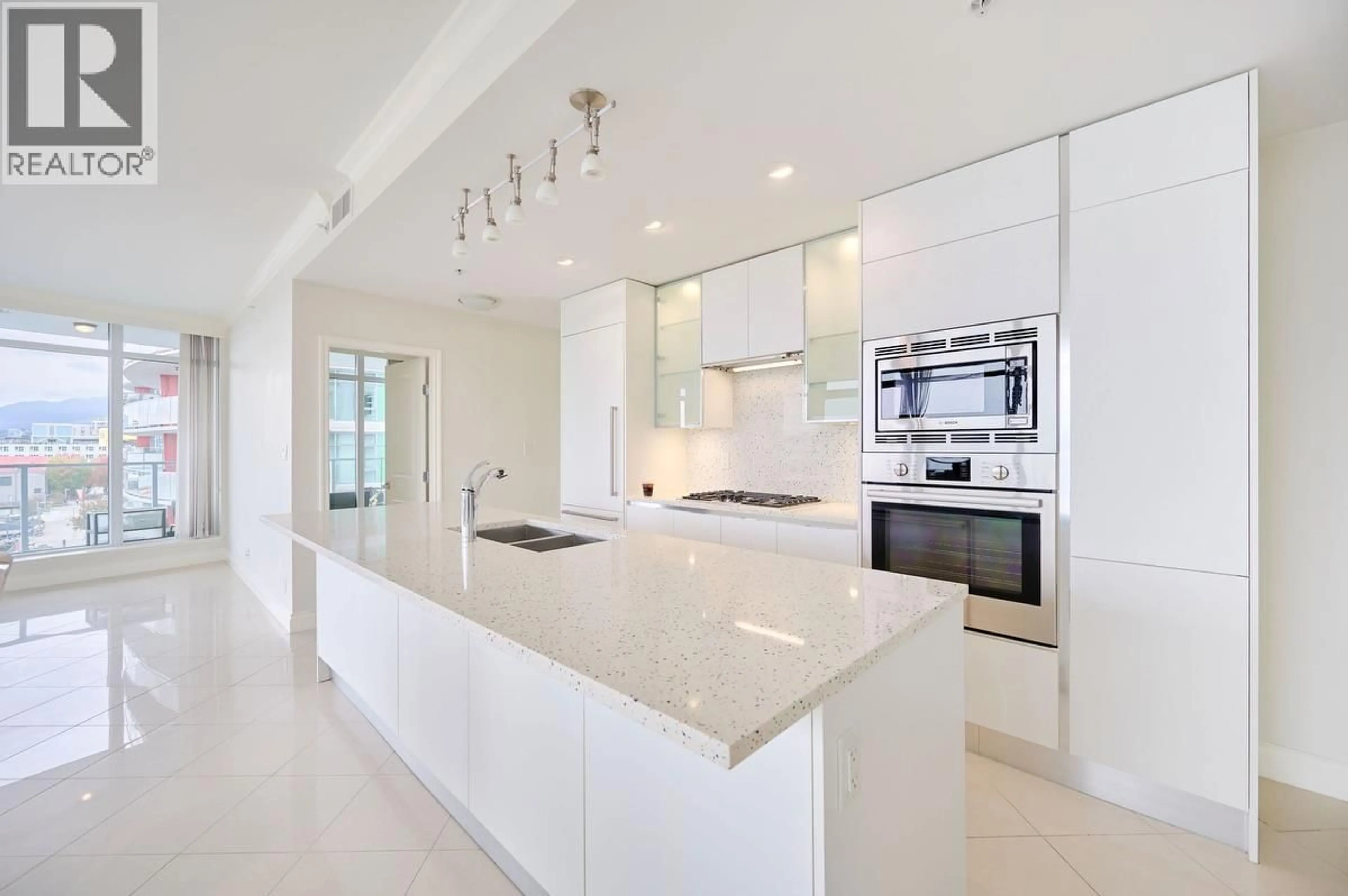 Contemporary kitchen, ceramic/tile floor for 401 - 199 VICTORY SHIP WAY, North Vancouver British Columbia V7L0B5