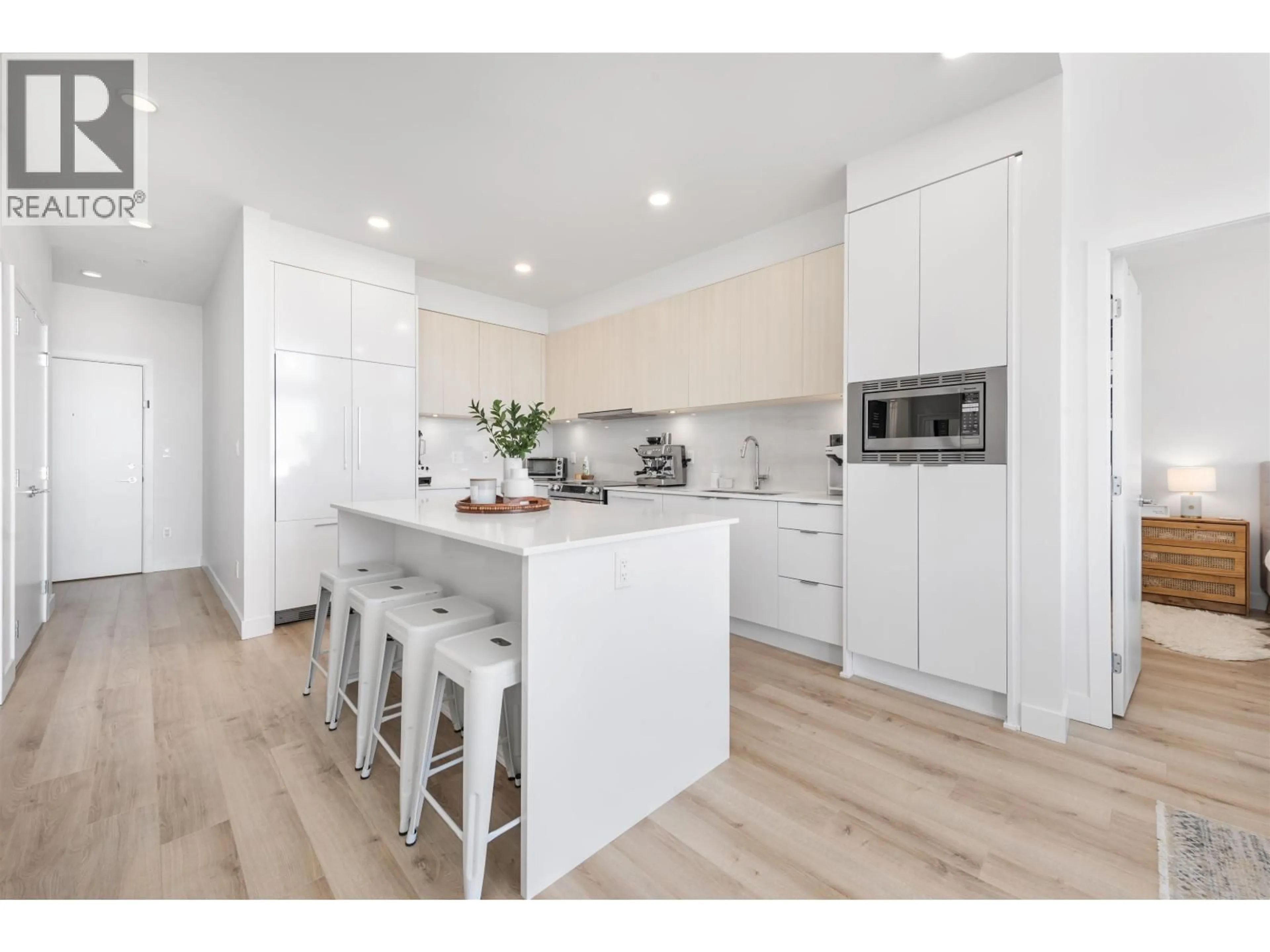 Open concept kitchen, wood/laminate floor for 401 - 1892 STARLING DRIVE, Tsawwassen British Columbia V4M0C7