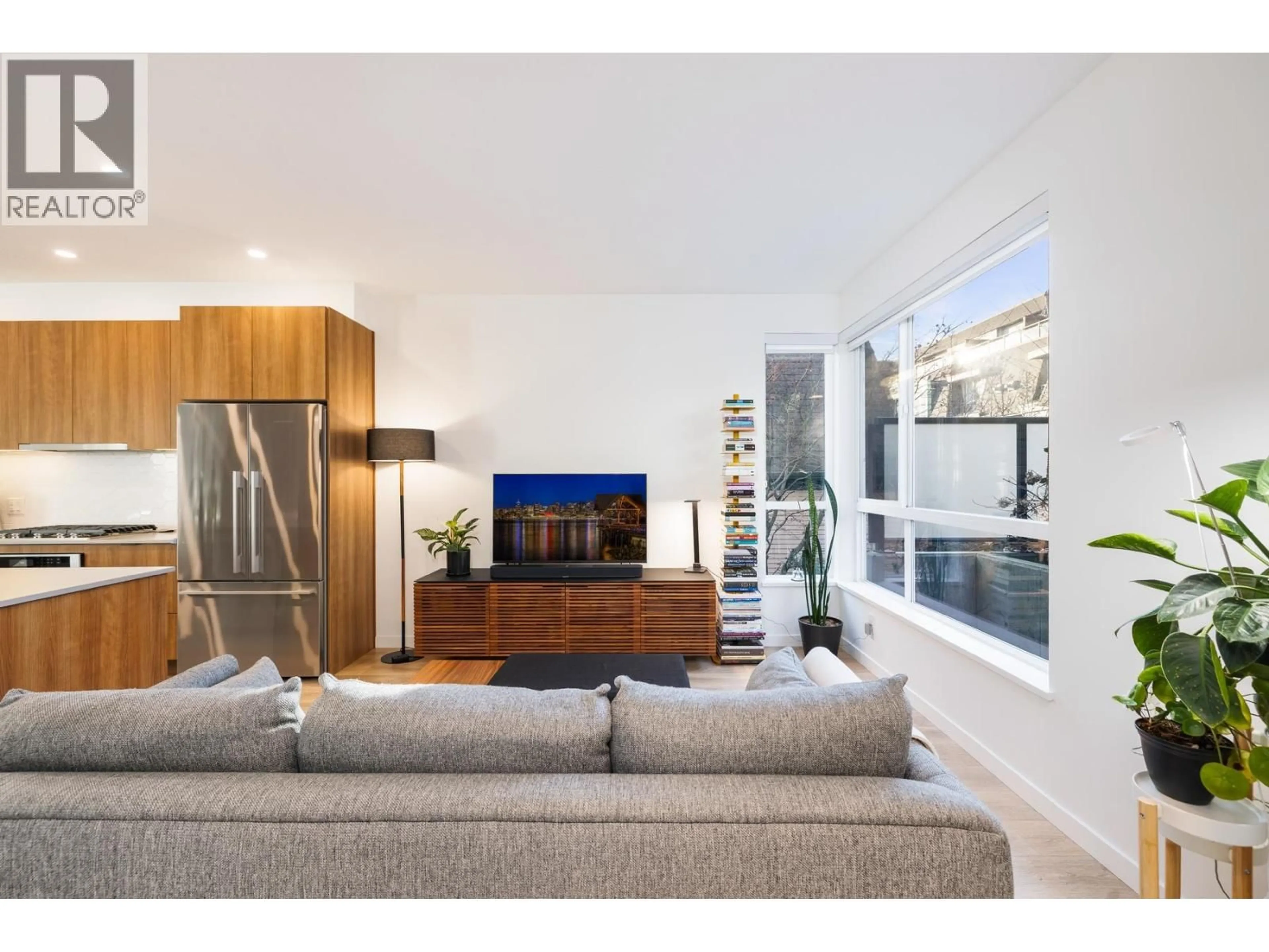 Living room with furniture, wood/laminate floor for 13 - 533 3RD STREET, North Vancouver British Columbia V7L1G4