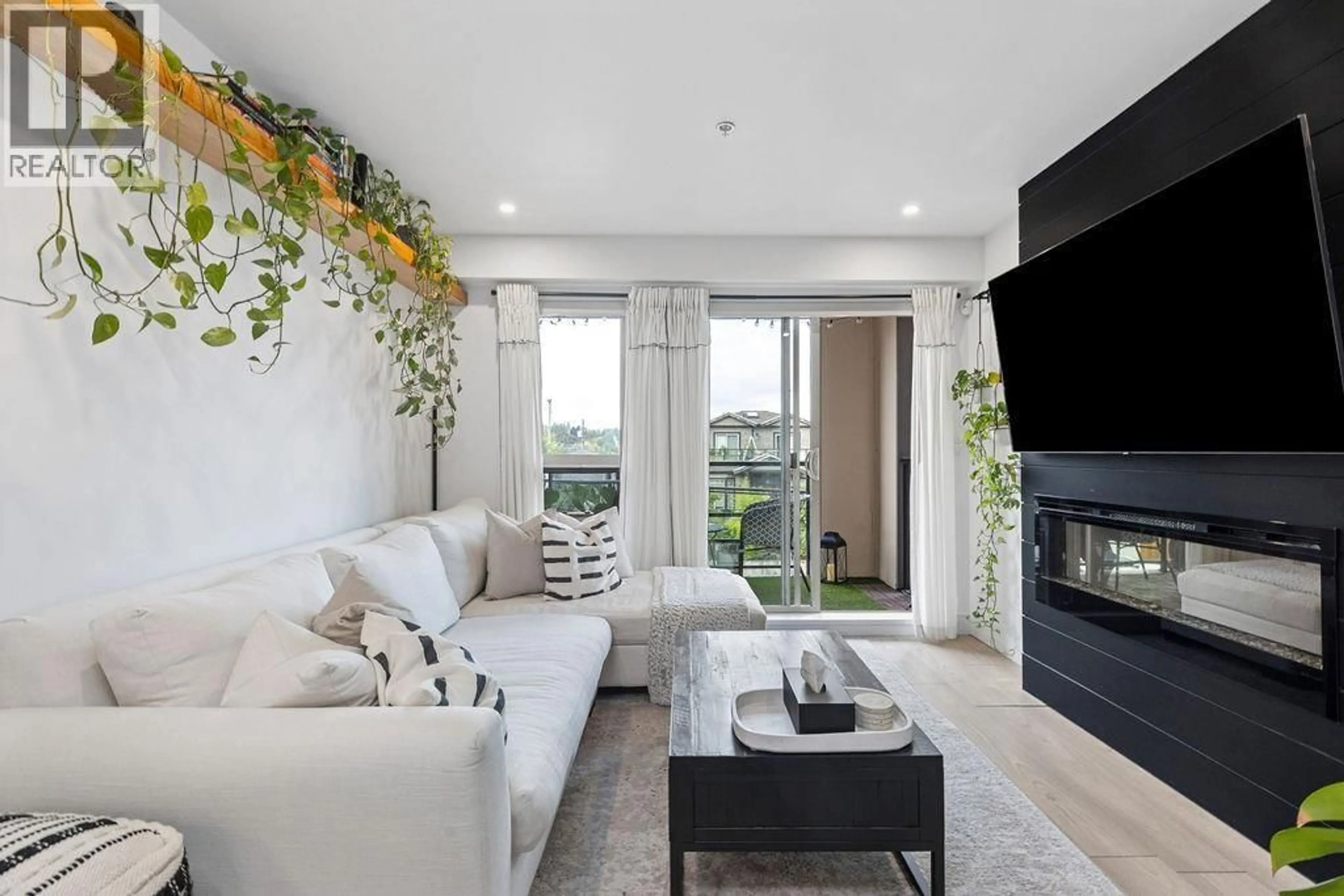 Living room with furniture, unknown for 232 - 4550 FRASER STREET, Vancouver British Columbia V5V4G8