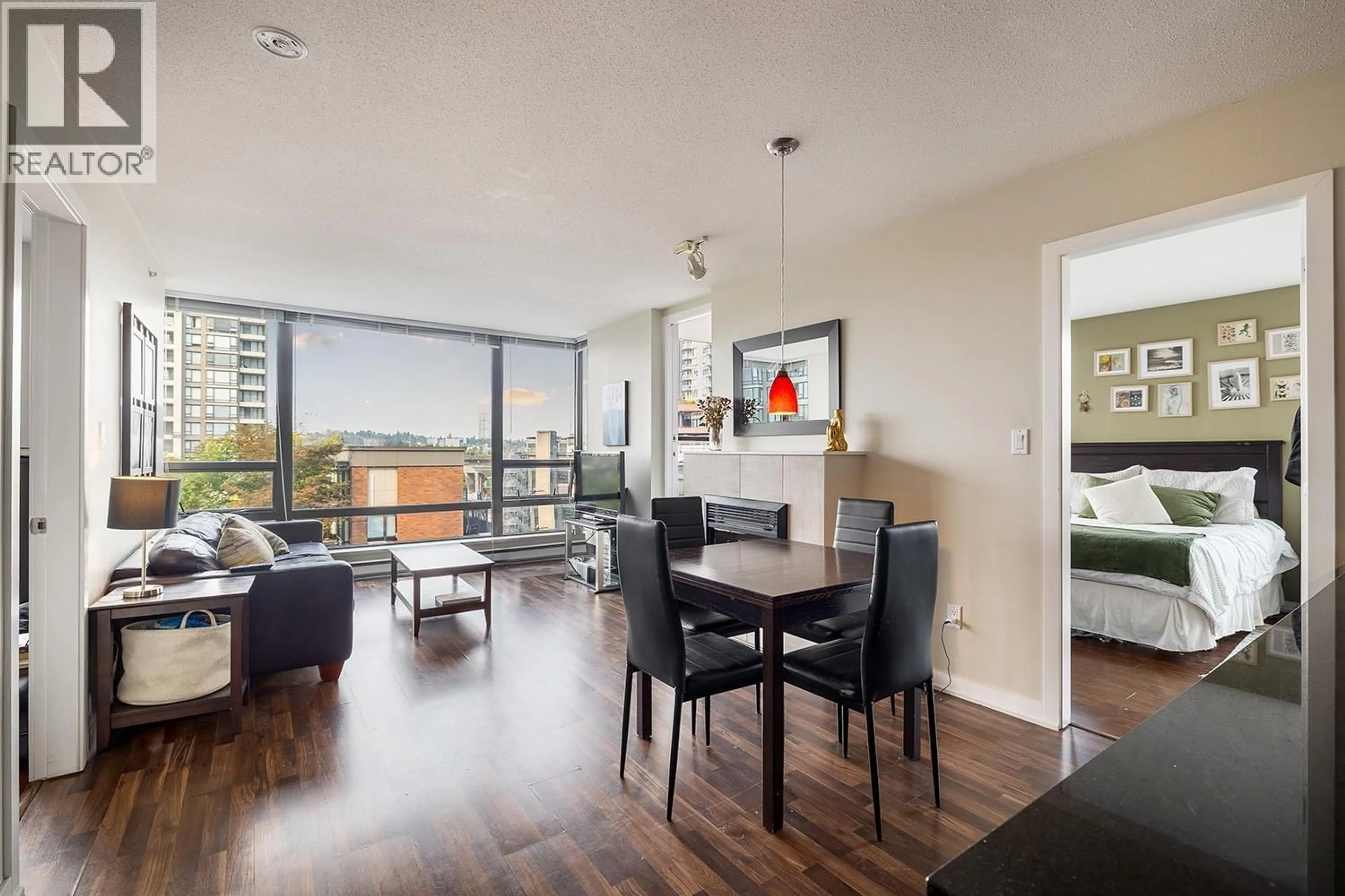 Living room with furniture, wood/laminate floor for 506 - 4182 DAWSON STREET, Burnaby British Columbia V5C0A2