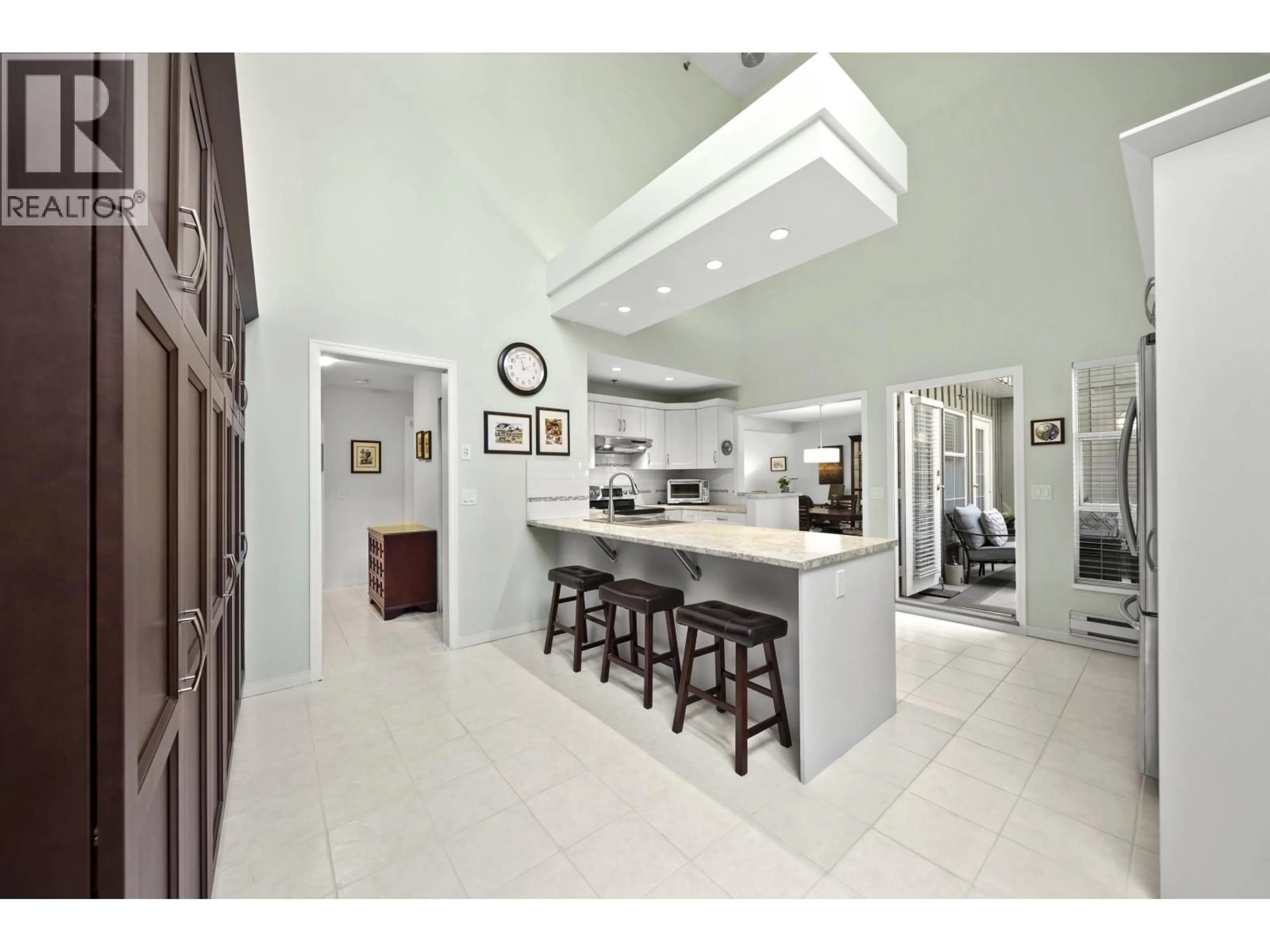 Open concept kitchen, ceramic/tile floor for 401 - 1154 WESTWOOD STREET, Coquitlam British Columbia V3B7J1